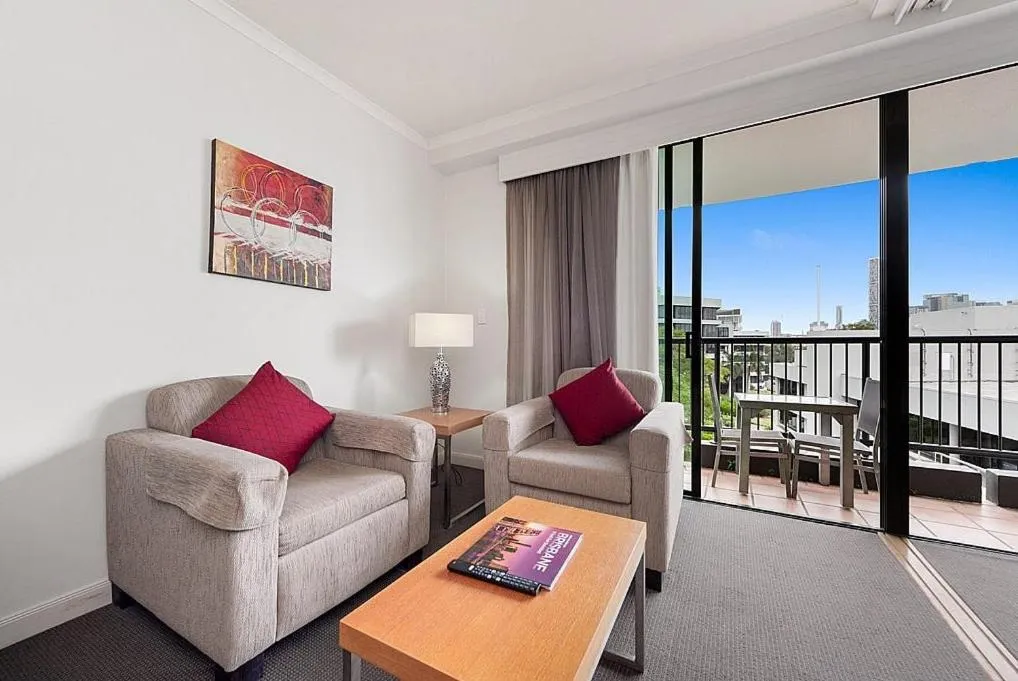 Living room in Cosmo Apartment Hotel