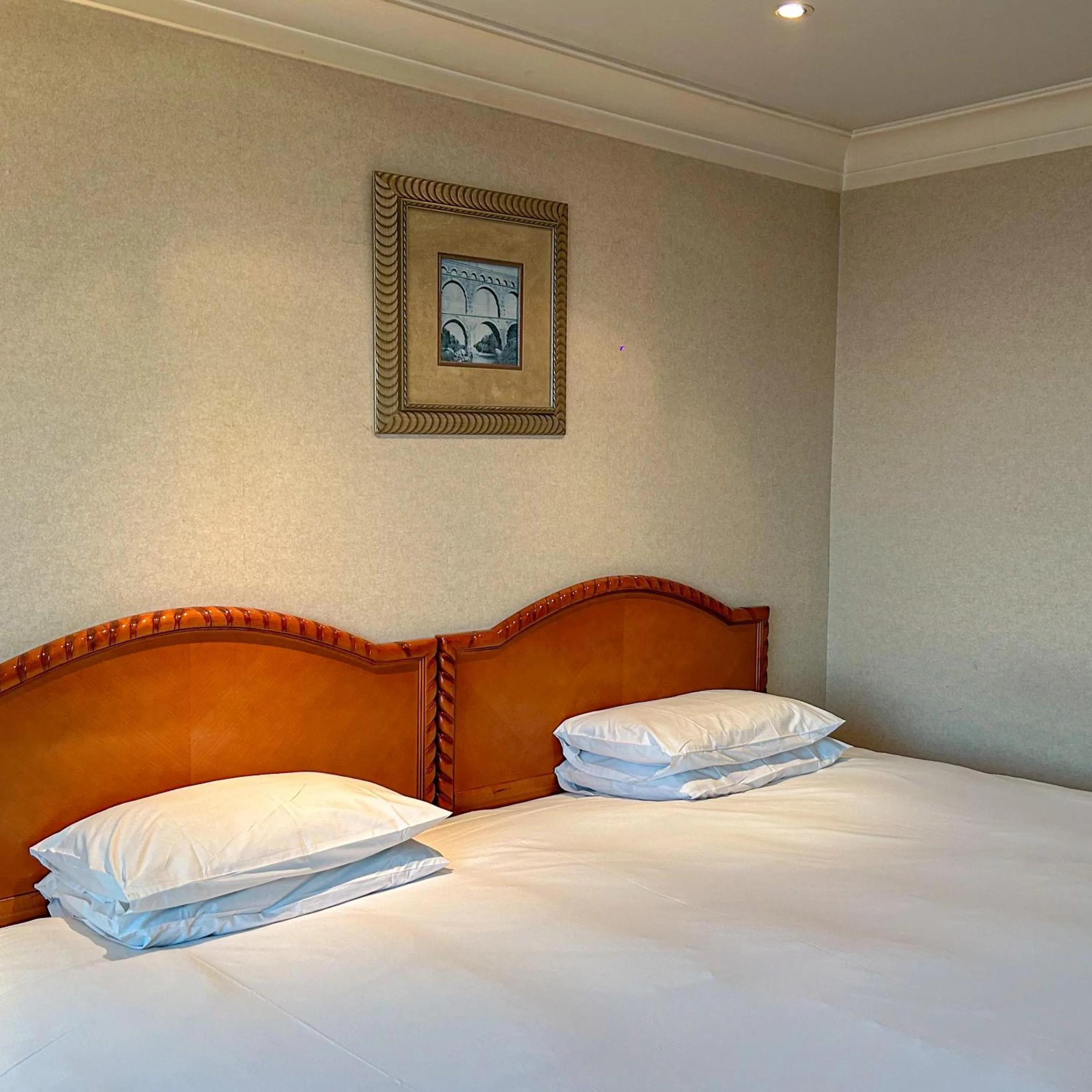 Bed in Jeju Oriental Hotel & Casino