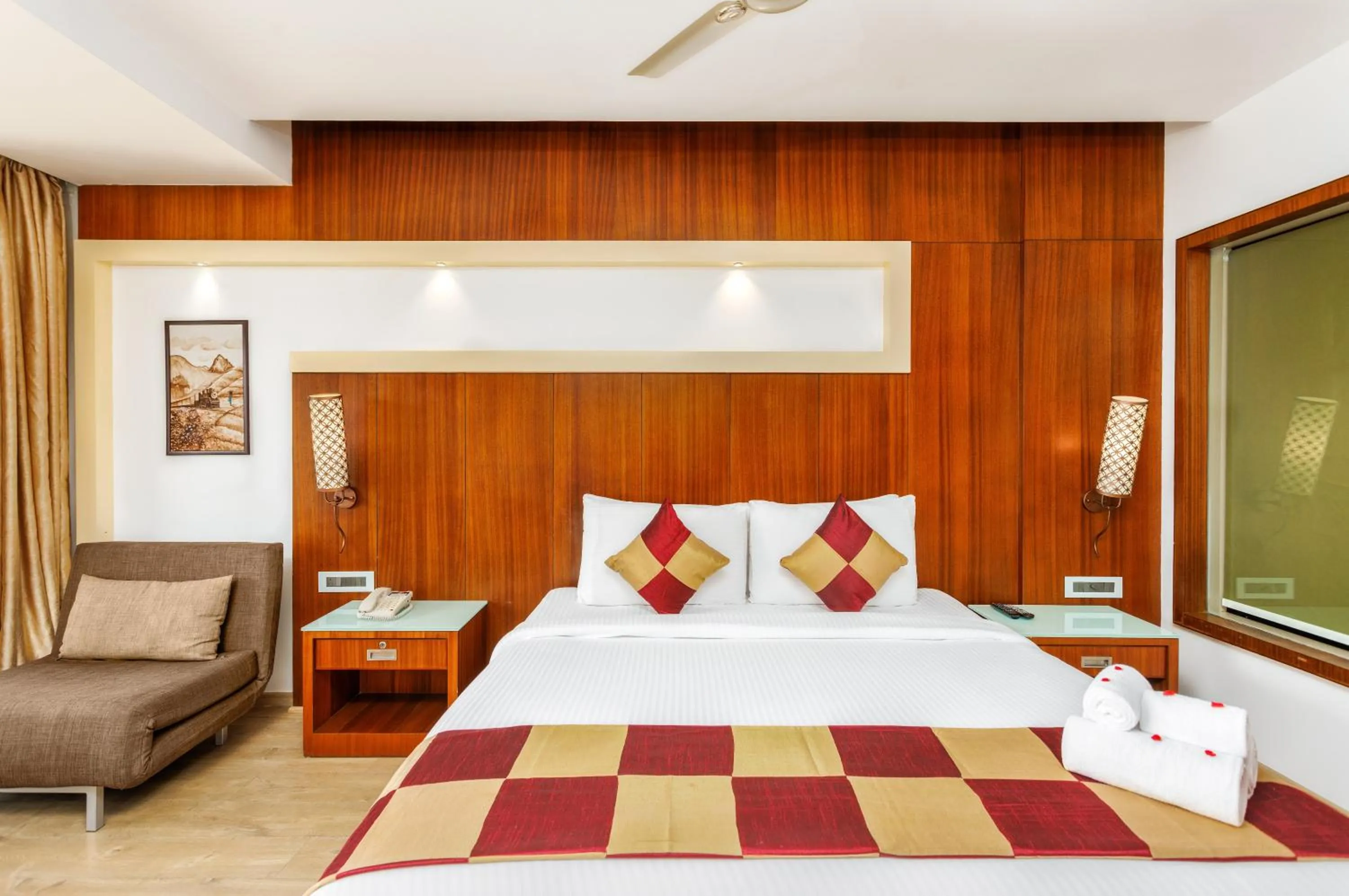 Bed in Amber Dale Luxury Hotel & Spa, Munnar