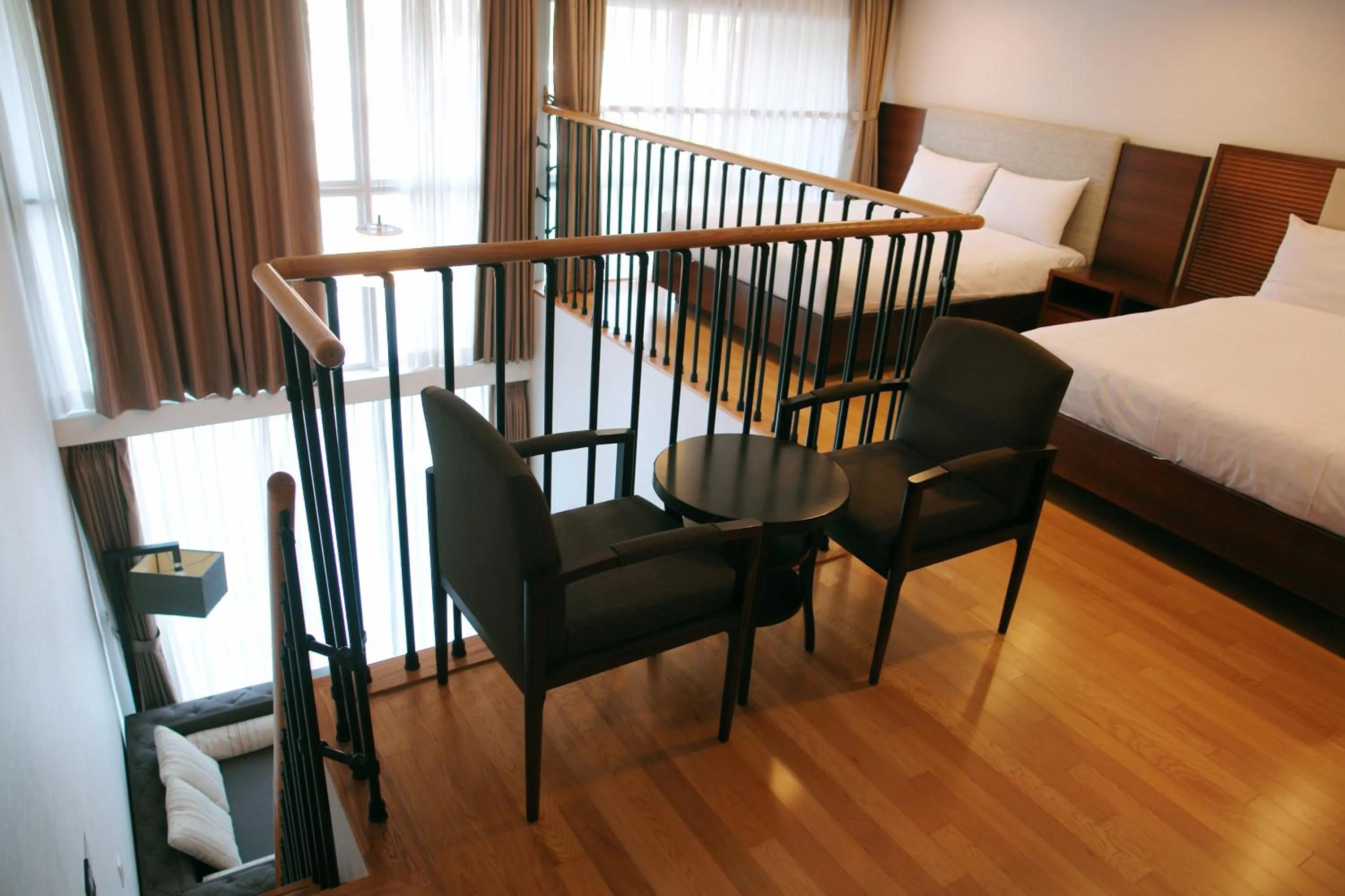 Seating area, Bed in Hotel Riviera Geoje