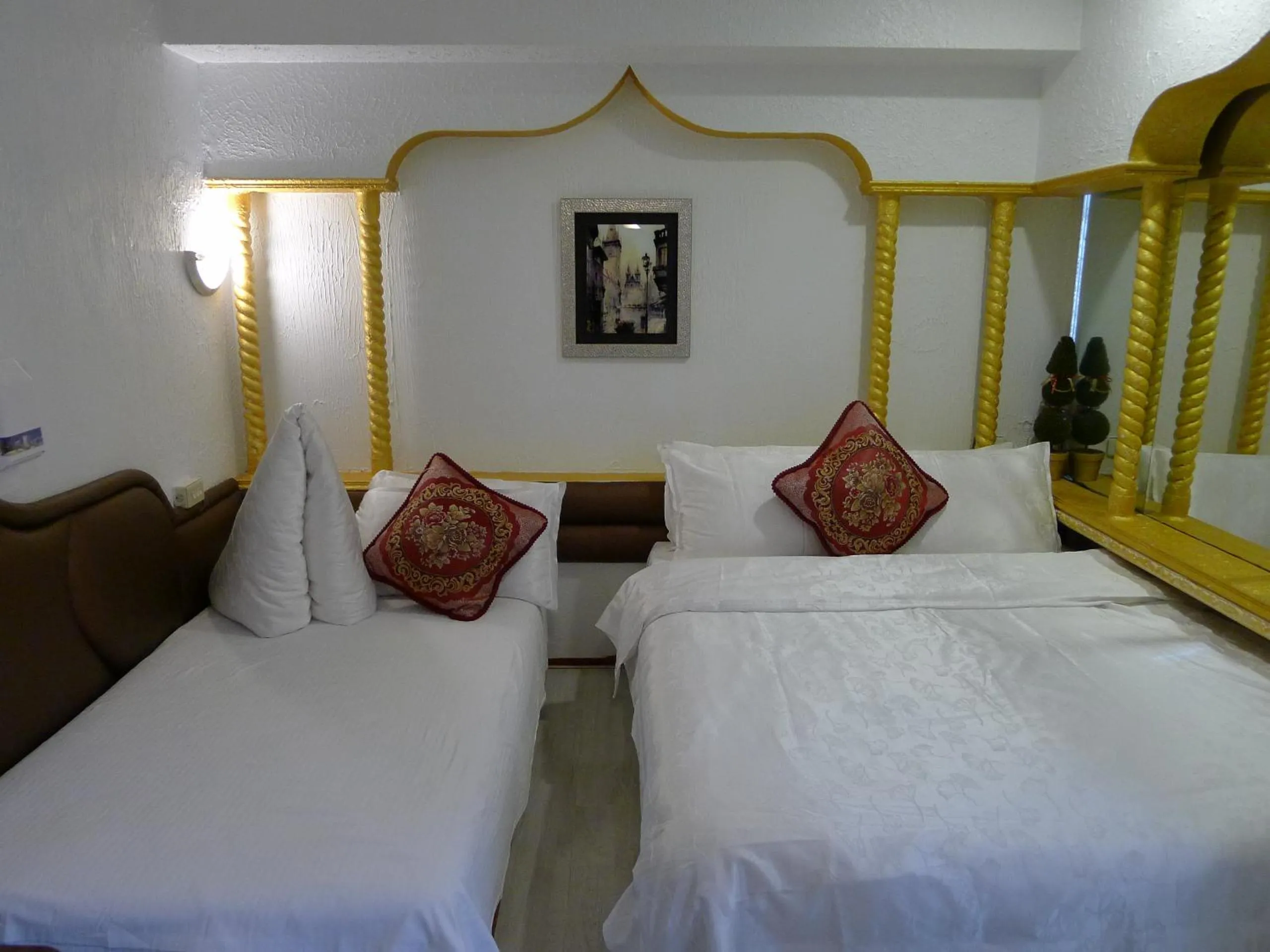Bed in Aloha Hotel