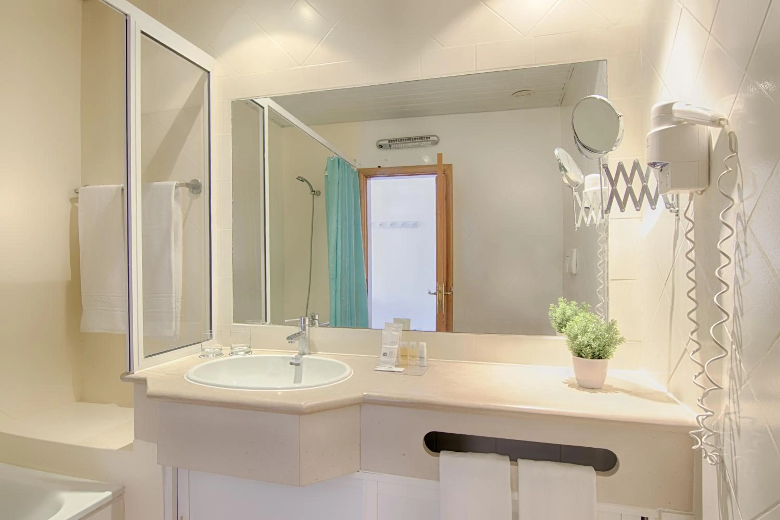 Toilet in Luna Miramar Club