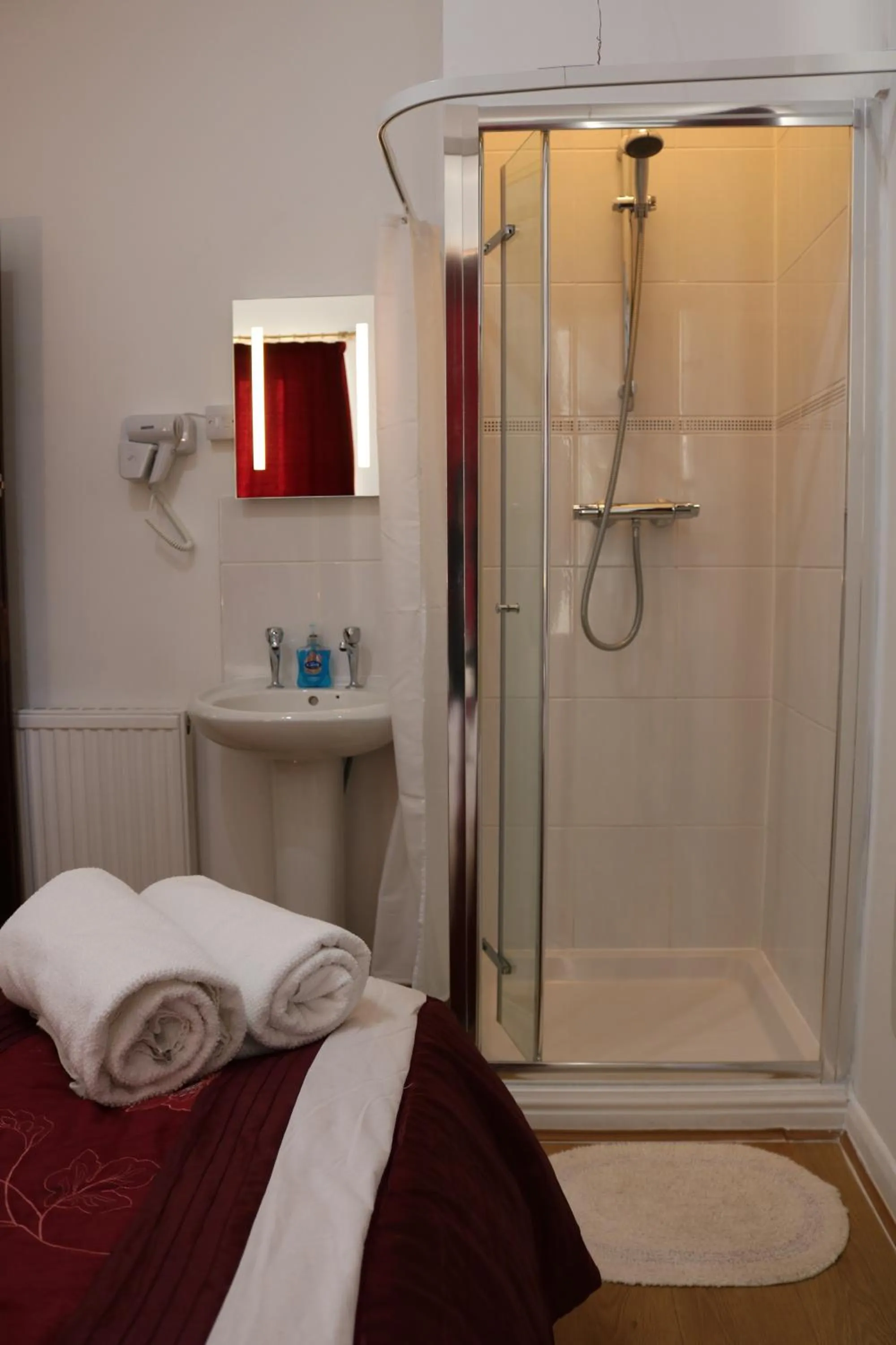 Shower, Bed in Anand Lodge