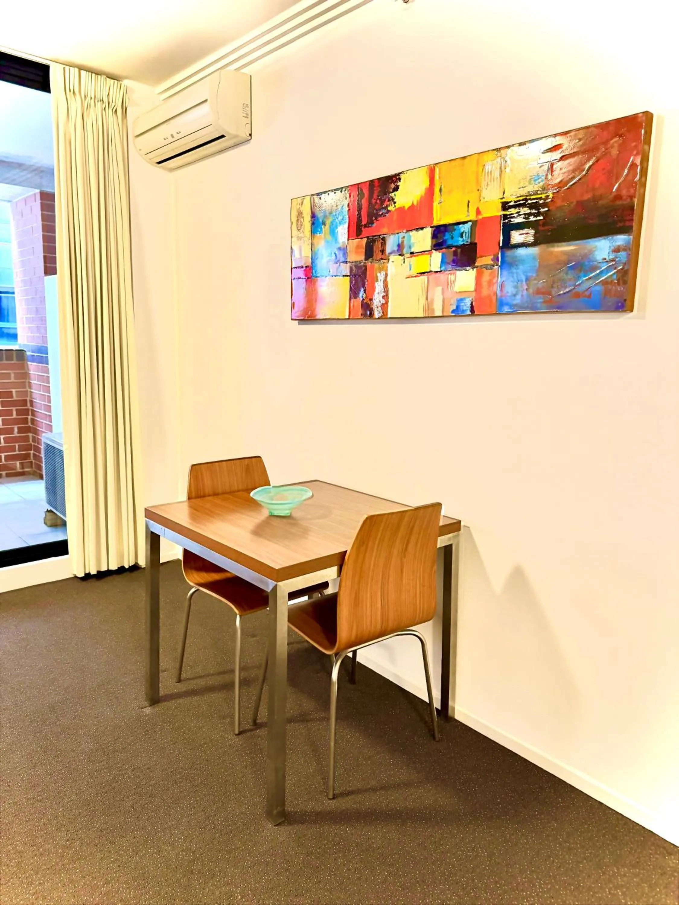 Living room in APX Darling Harbour