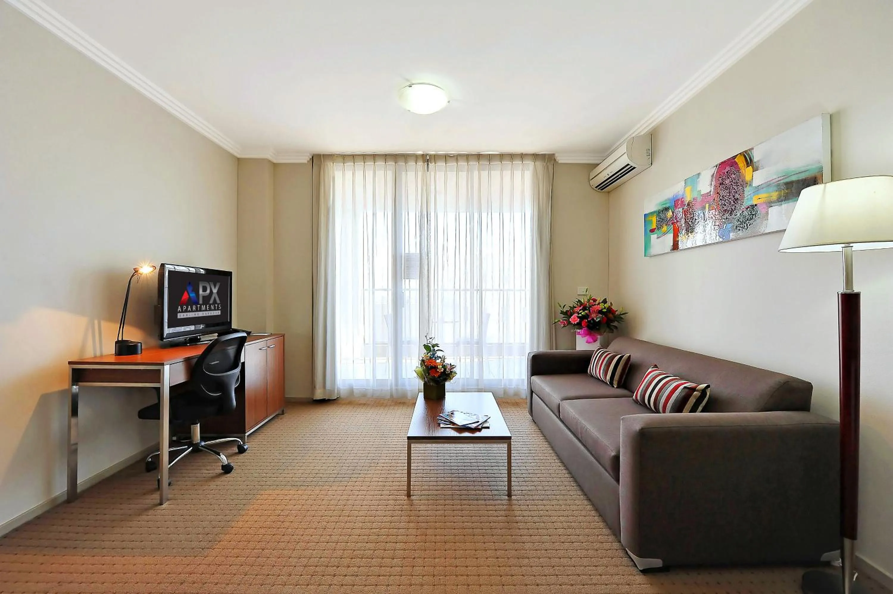 Communal lounge/ TV room in APX Darling Harbour