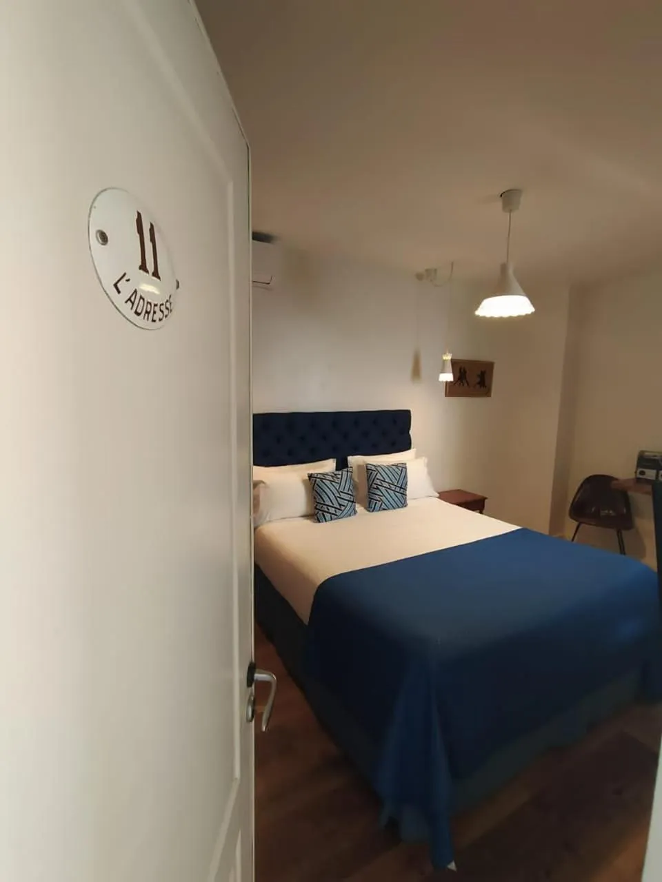 Bed in L'Adresse Hôtel Boutique