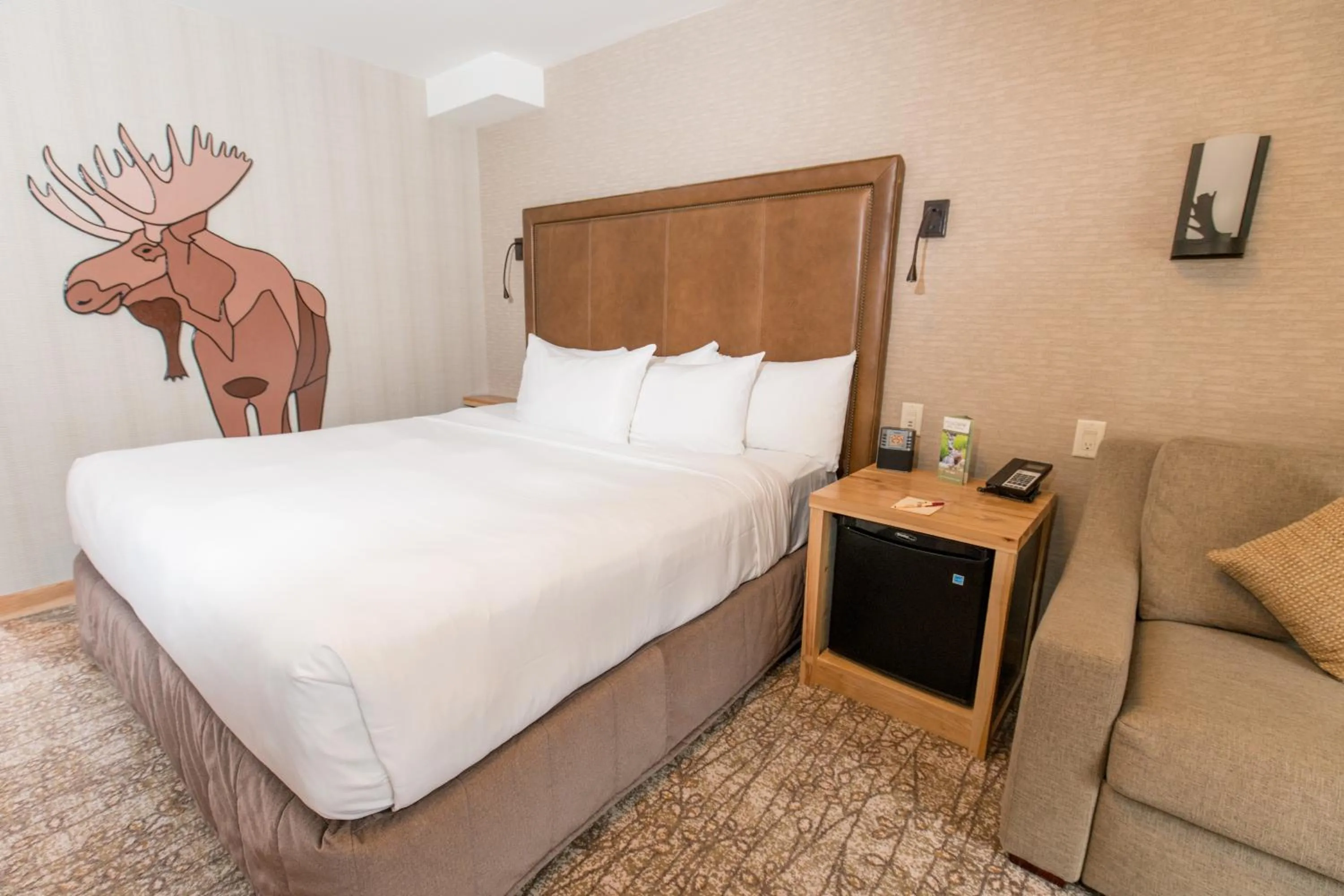 Bed in Moose Hotel and Suites