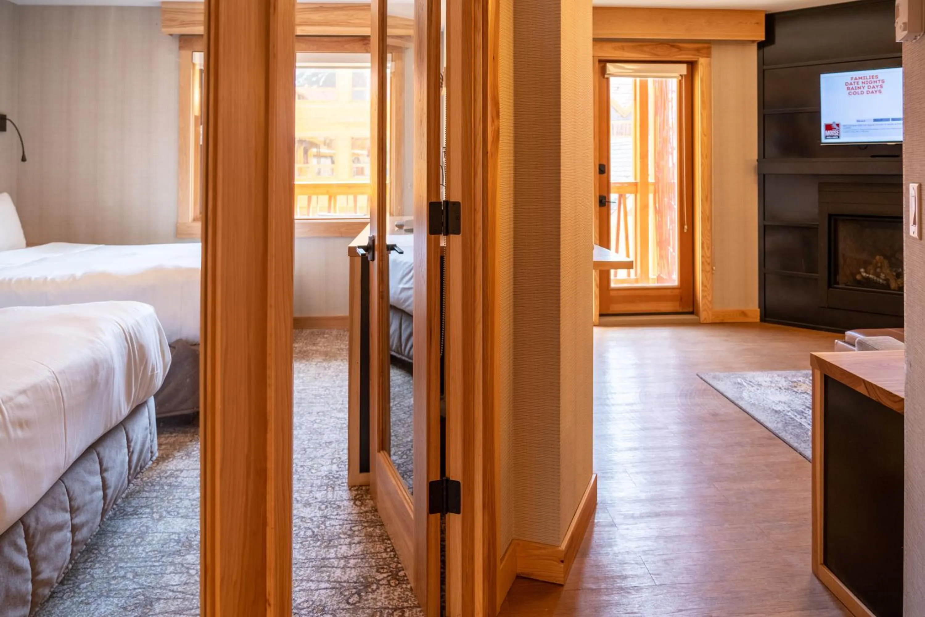 Photo of the whole room, Bed in Moose Hotel and Suites