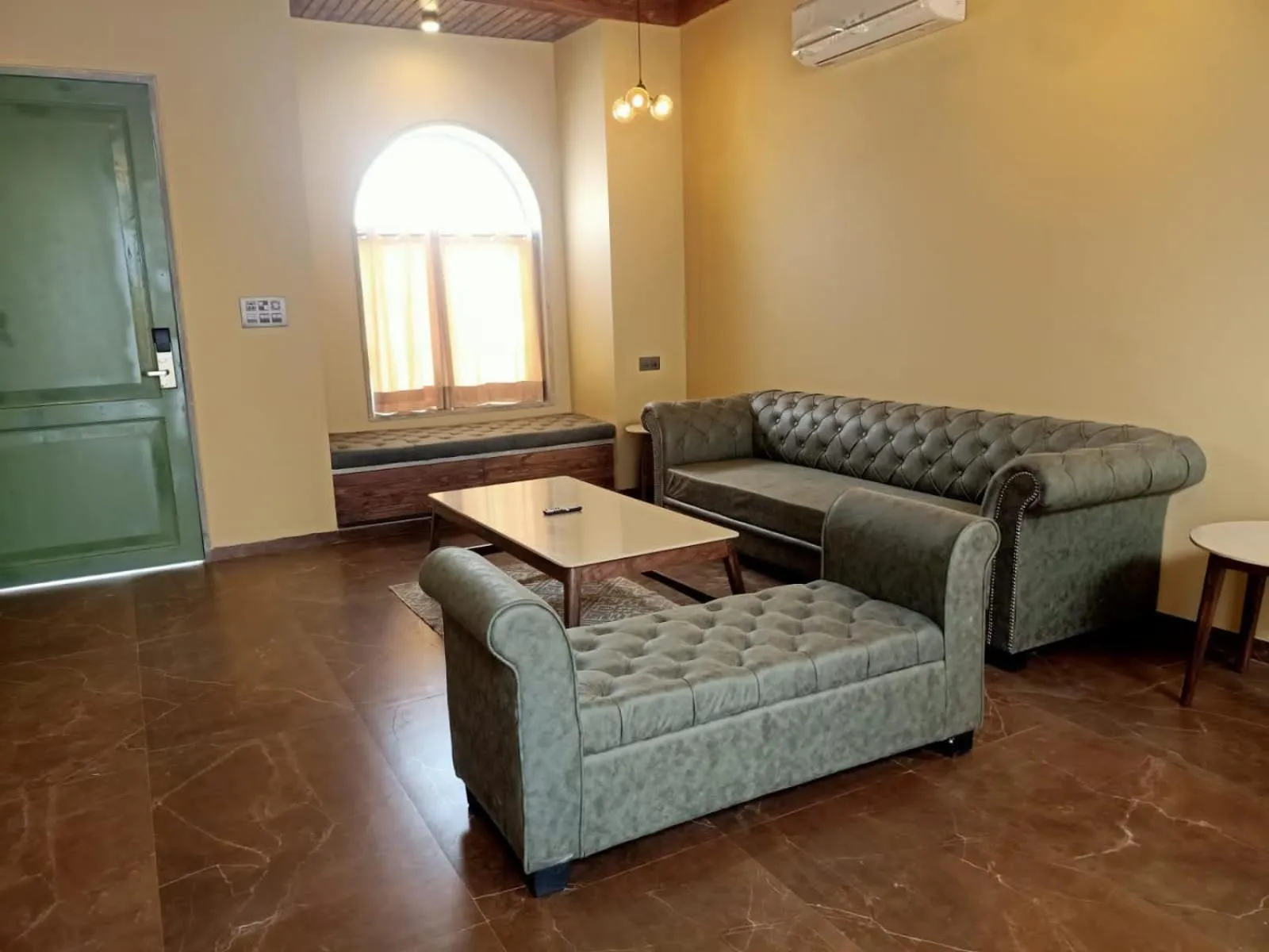 Seating area in Riverarch Greenfields Resort