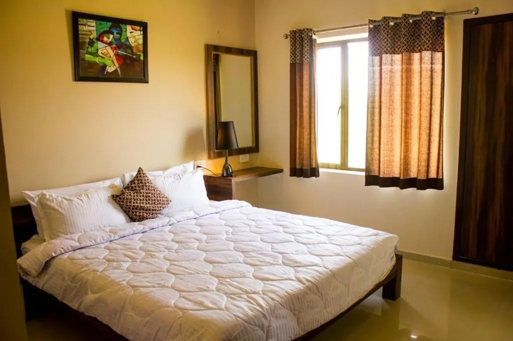 Bed in Riverarch Greenfields Resort