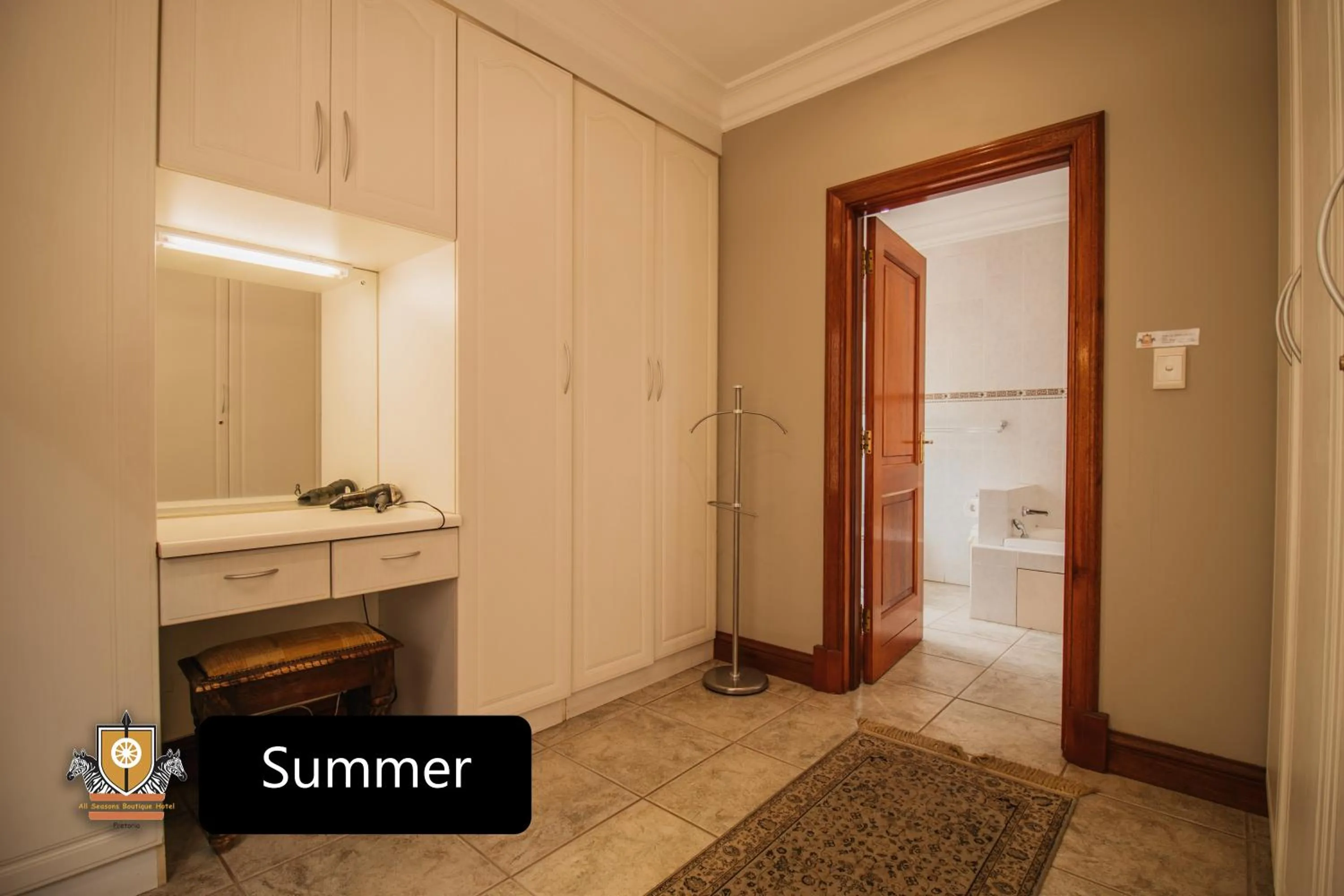 wardrobe in All Seasons Boutique Hotel - Sustainable Electricity and Water