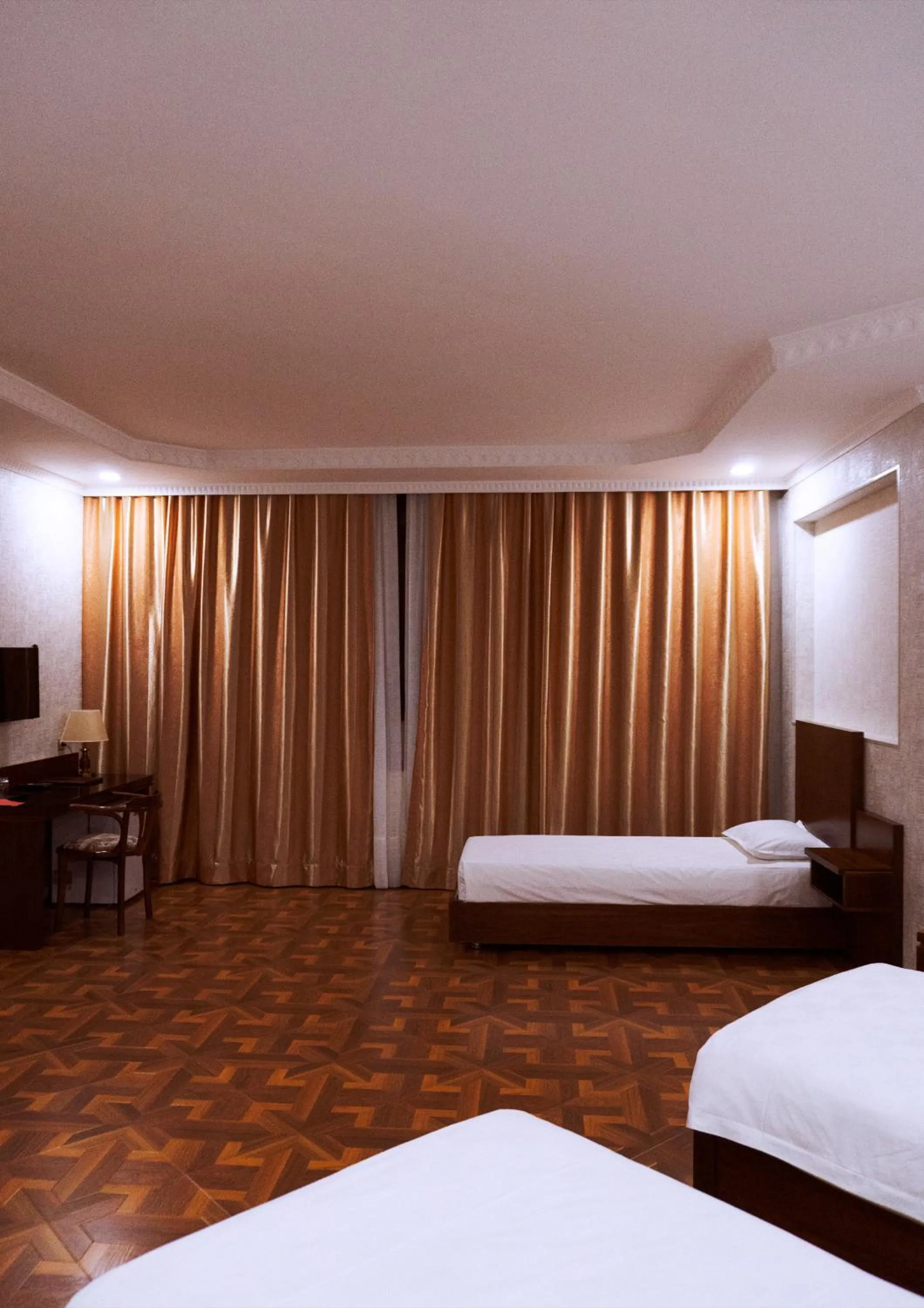 Bed in Omar Khayyam Hotel