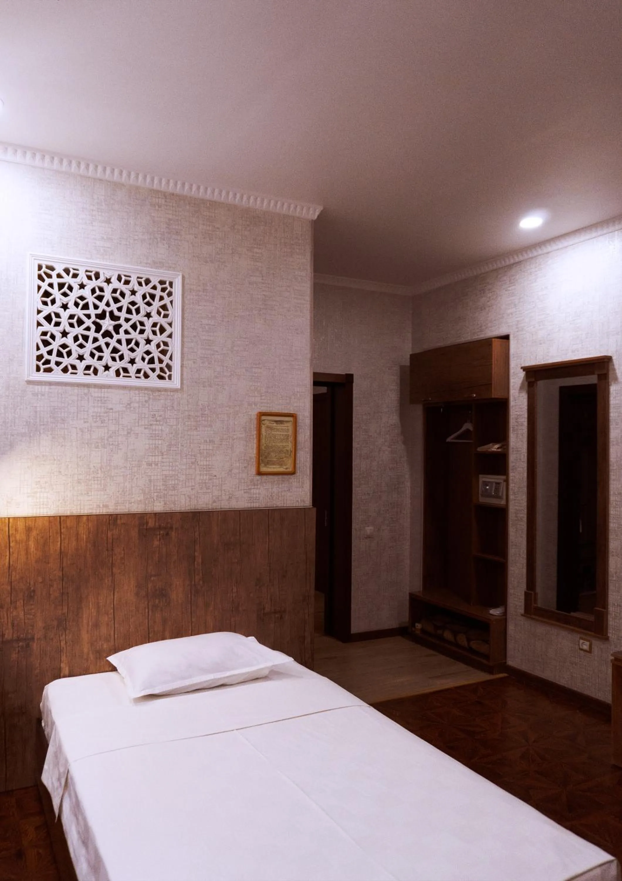 Bed in Omar Khayyam Hotel