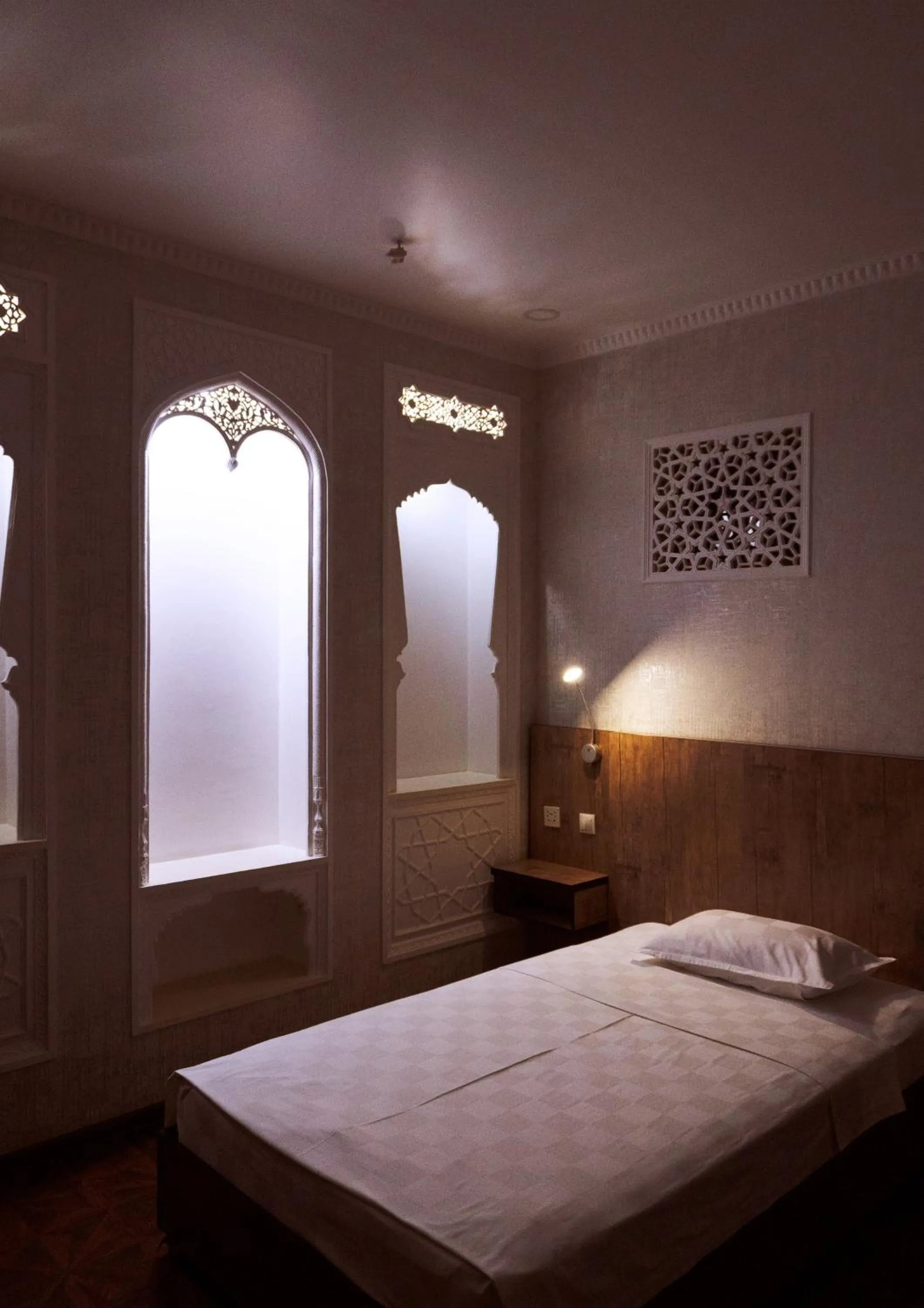 Bed in Omar Khayyam Hotel