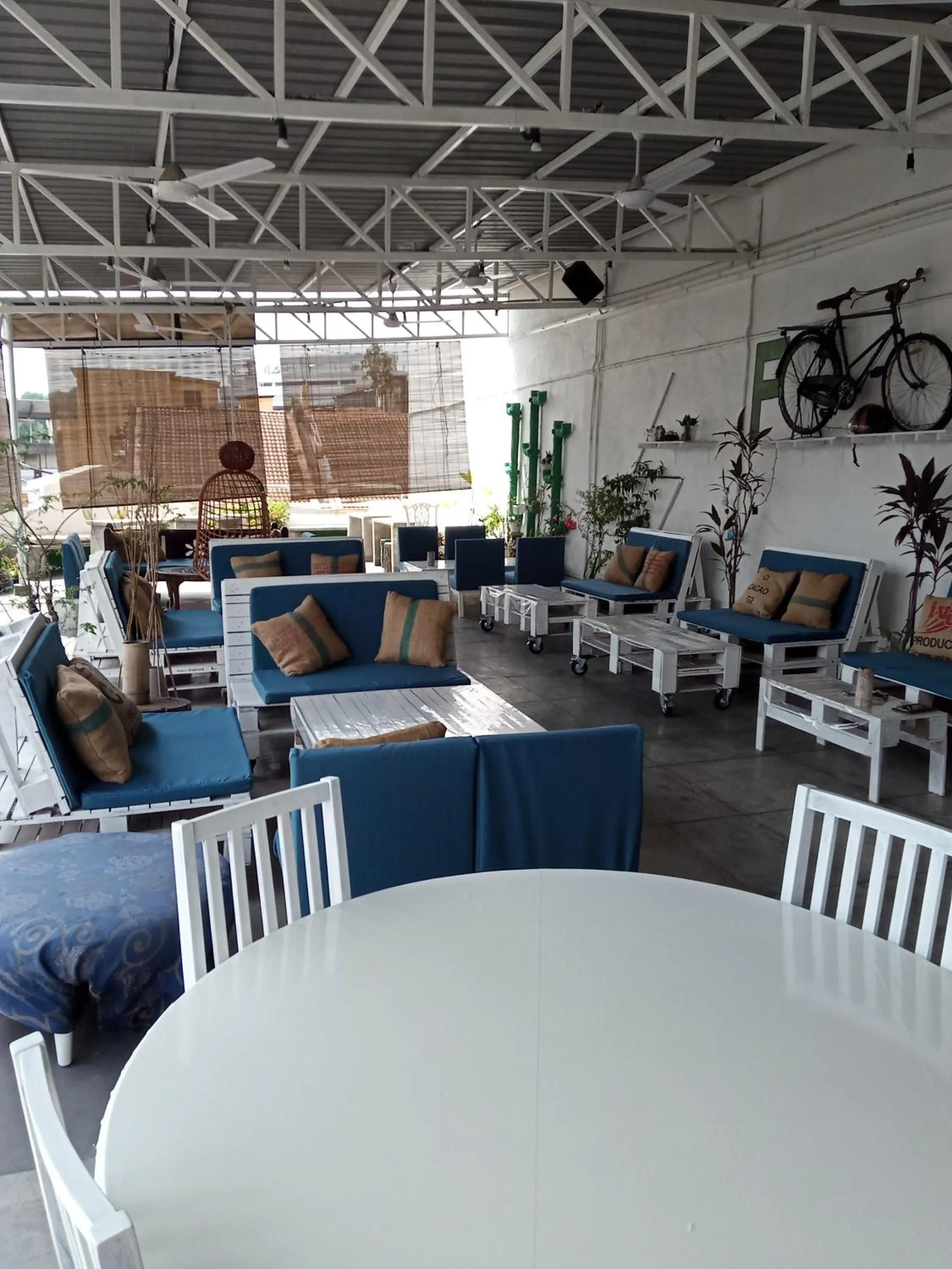 Seating area in Birdnest Guesthouse, Gaia Rooftop Cafe