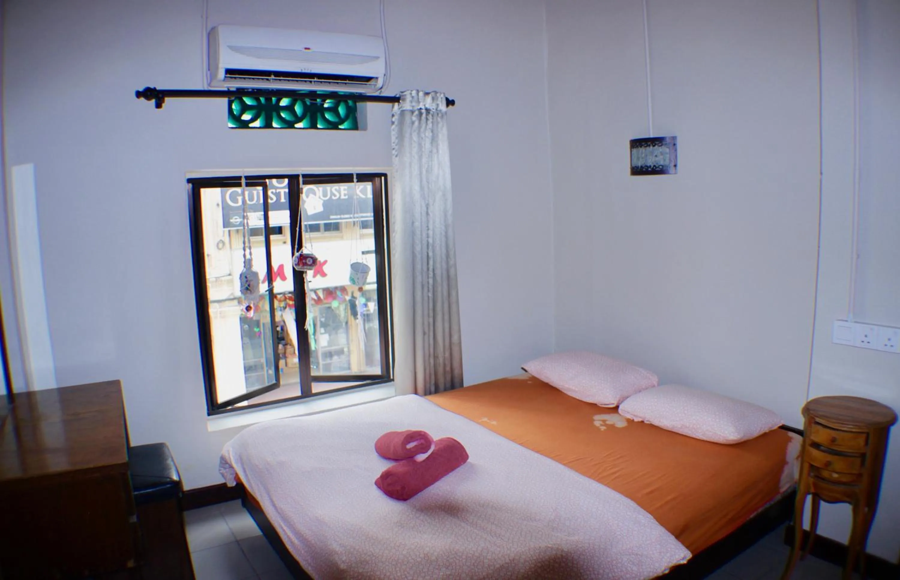 Bed in Birdnest Guesthouse, Gaia Rooftop Cafe