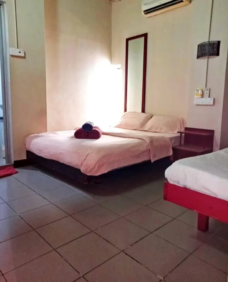 Bed in Birdnest Guesthouse, Gaia Rooftop Cafe