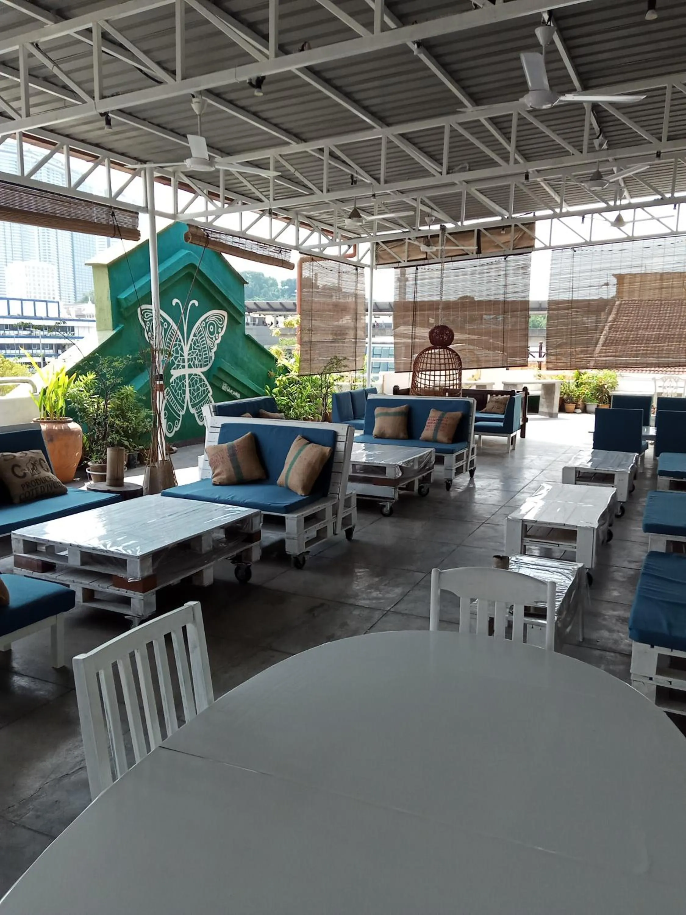 Seating area in Birdnest Guesthouse, Gaia Rooftop Cafe