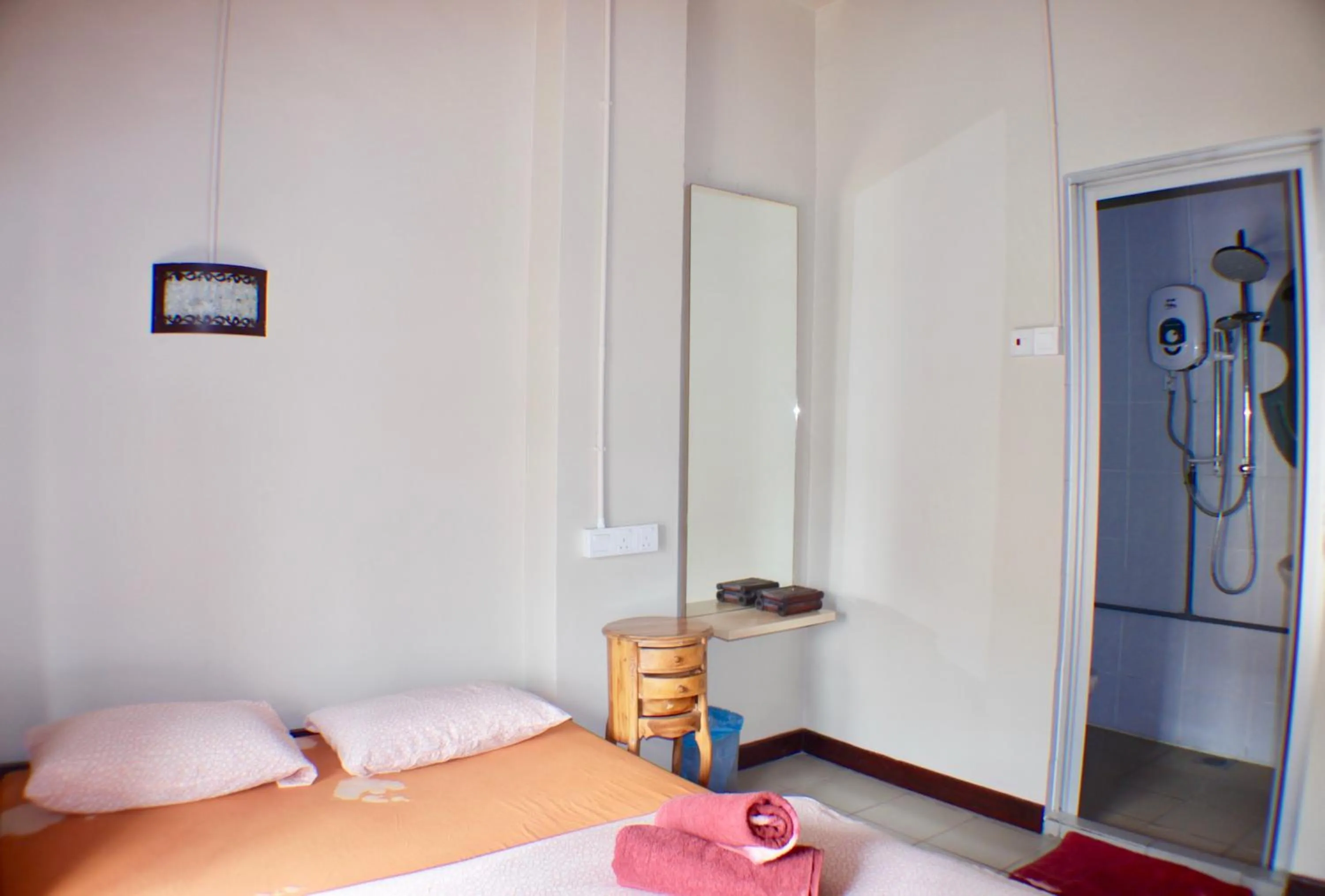 Bed in Birdnest Guesthouse, Gaia Rooftop Cafe