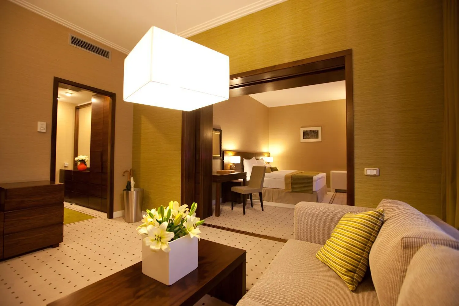 Living room, Bed in Capital Plaza Hotel