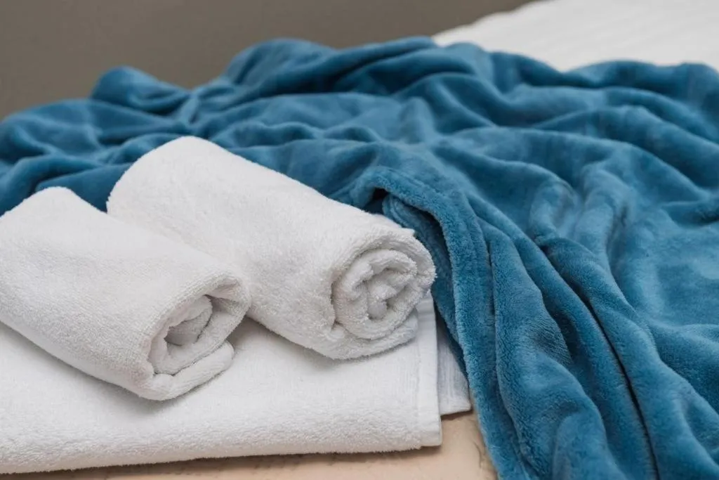 Decorative detail, Bed in Apartments ZoomZoom