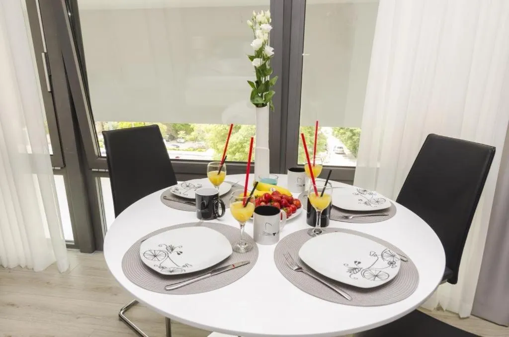 Dining area in Apartments ZoomZoom