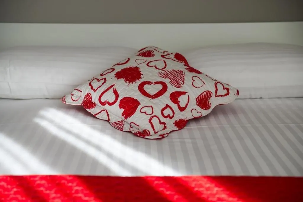 Decorative detail, Bed in Apartments ZoomZoom