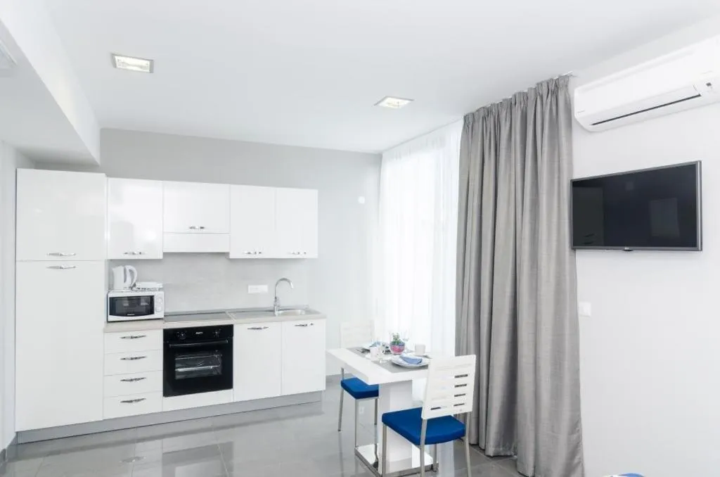 Kitchen or kitchenette in Apartments ZoomZoom