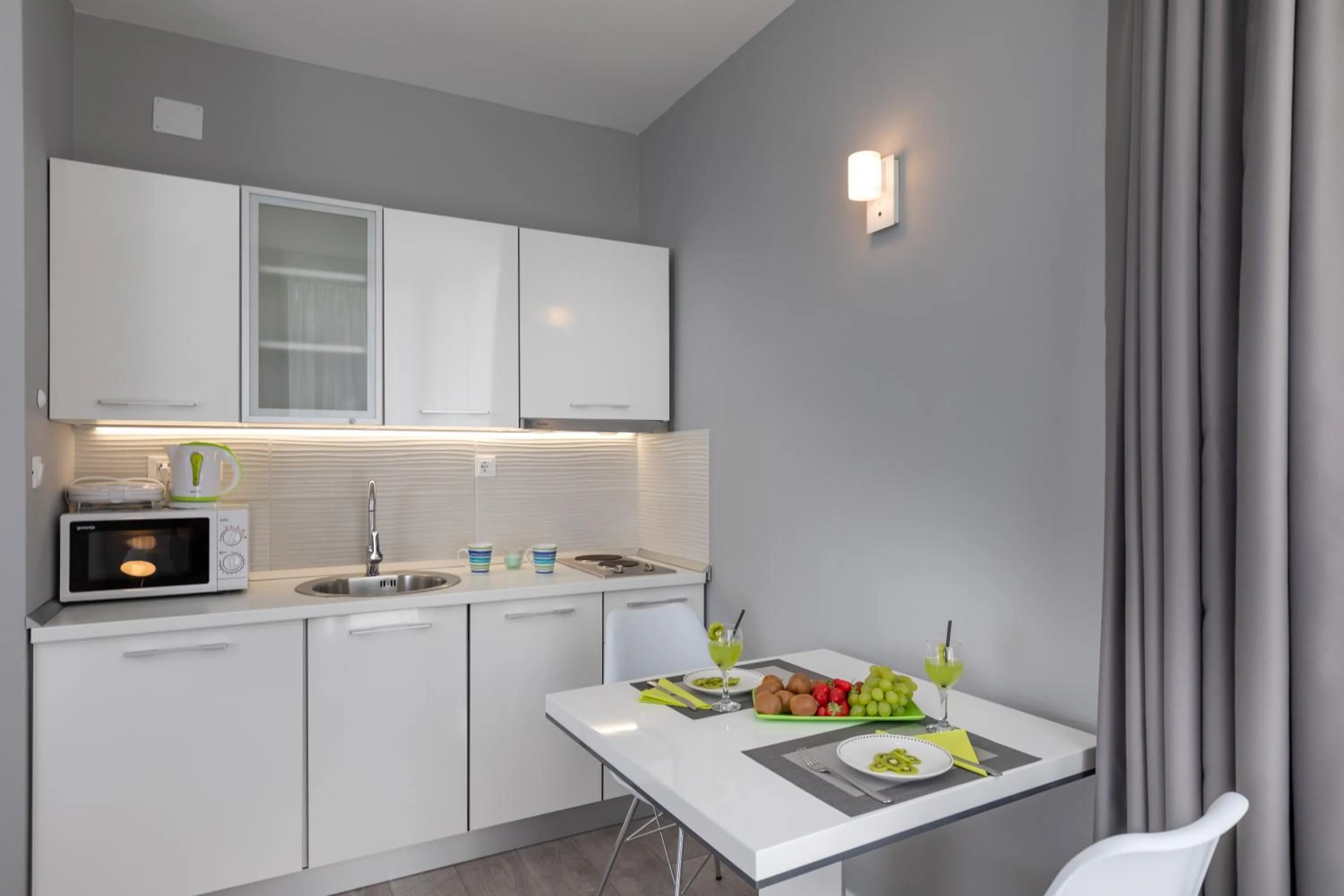 Kitchen or kitchenette in Apartments ZoomZoom