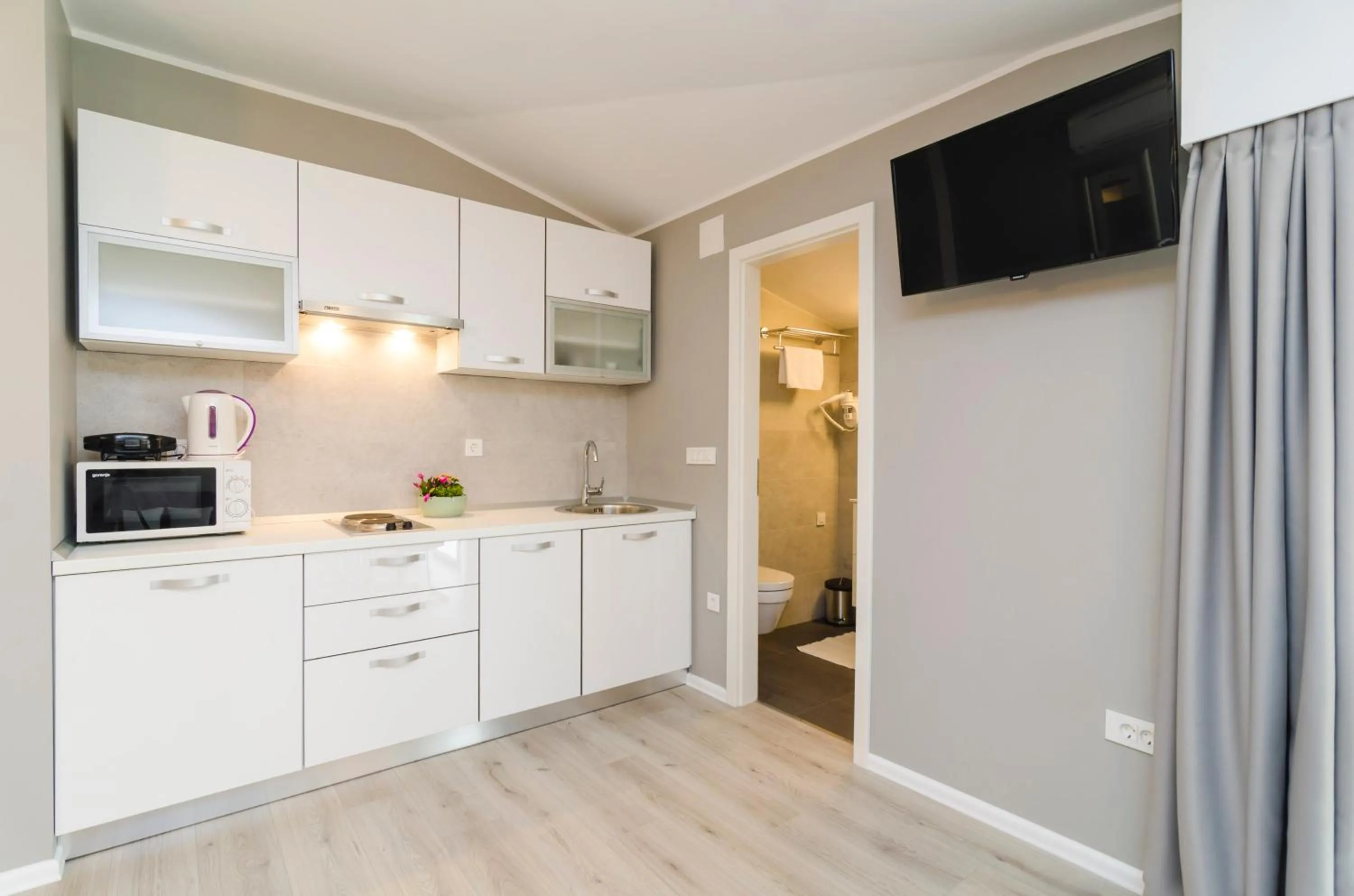 Kitchen or kitchenette in Apartments ZoomZoom