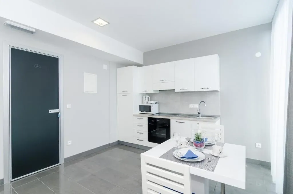 Kitchen or kitchenette in Apartments ZoomZoom