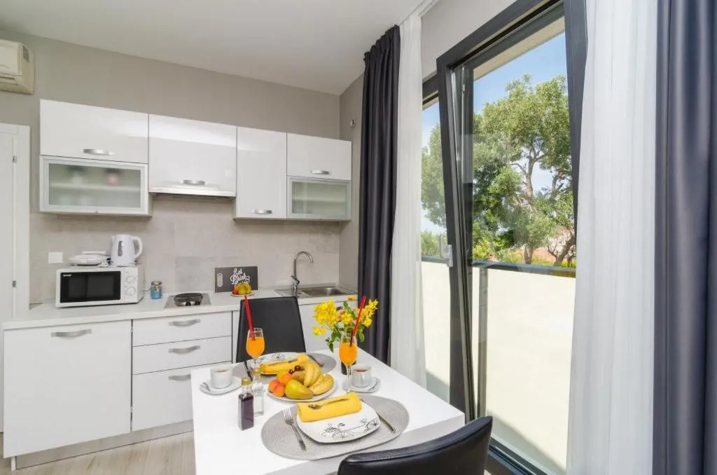 Dining area in Apartments ZoomZoom