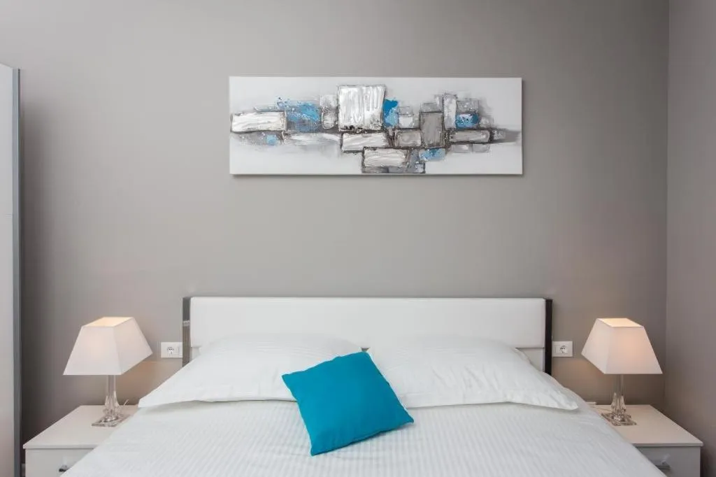 Bed in Apartments ZoomZoom