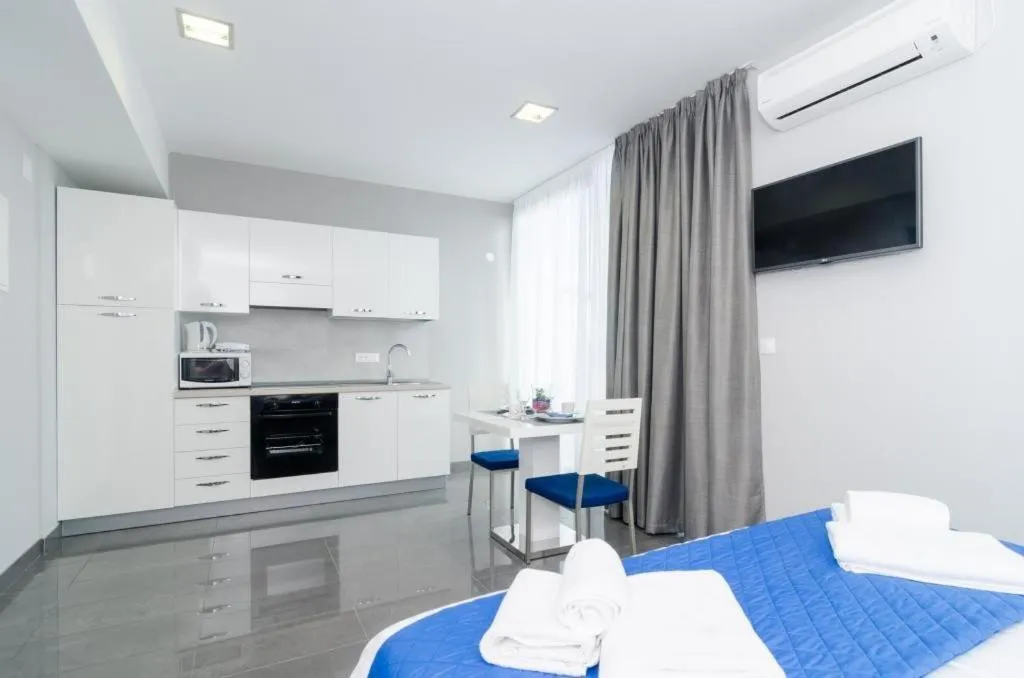 Kitchen or kitchenette in Apartments ZoomZoom