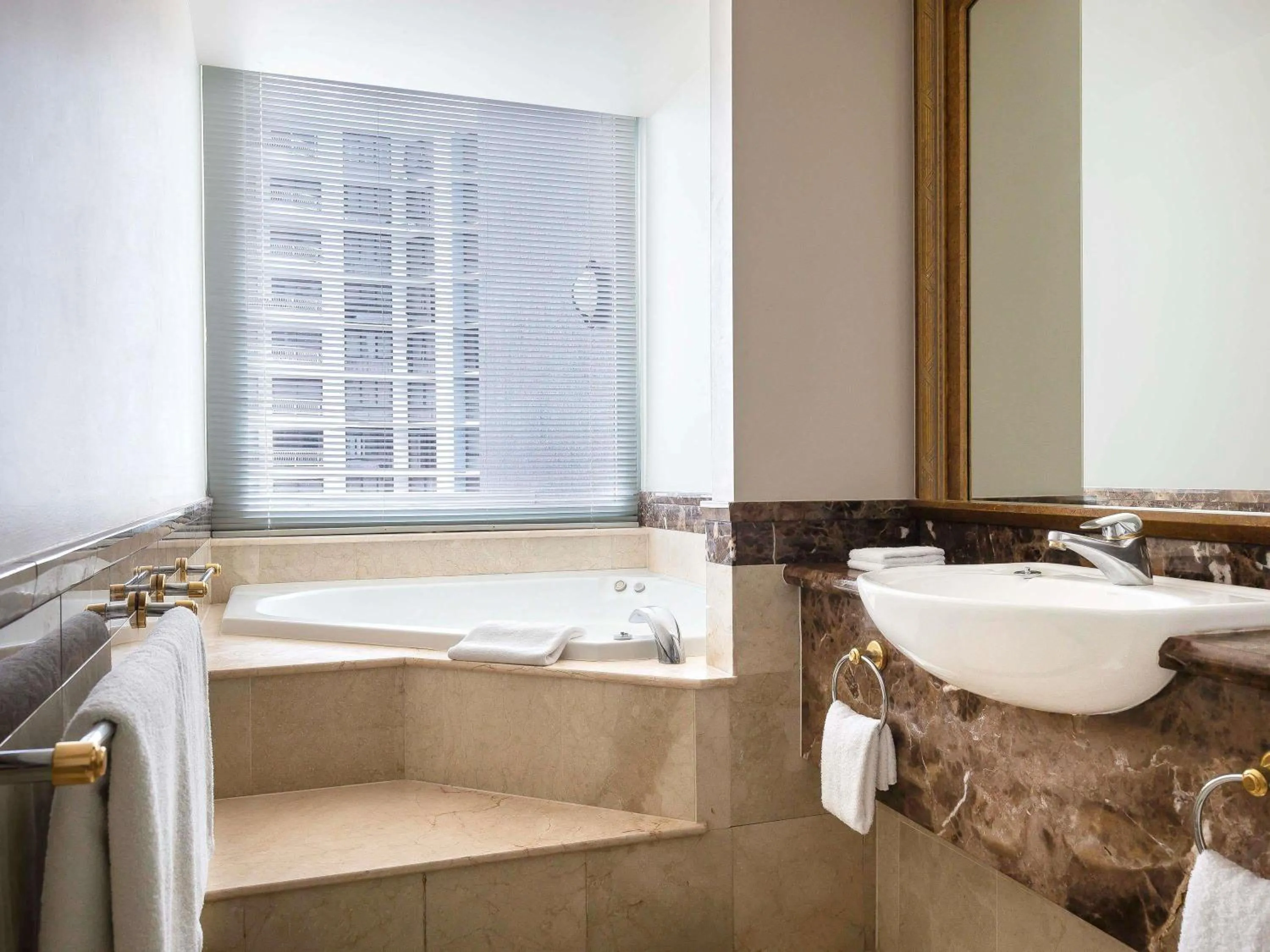 Bedroom in Mantra Legends Hotel