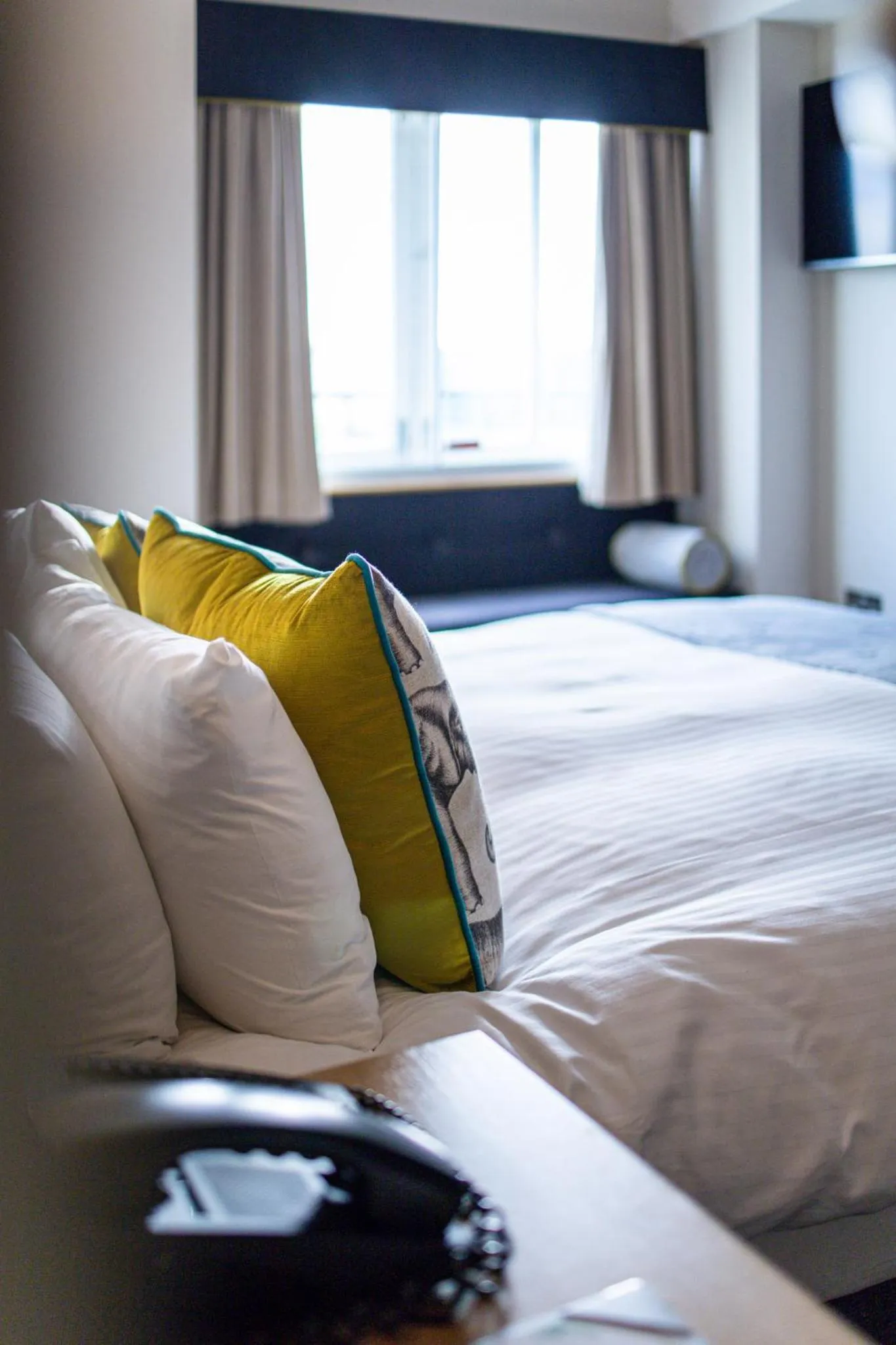 Bed in Ennios Boutique Hotel