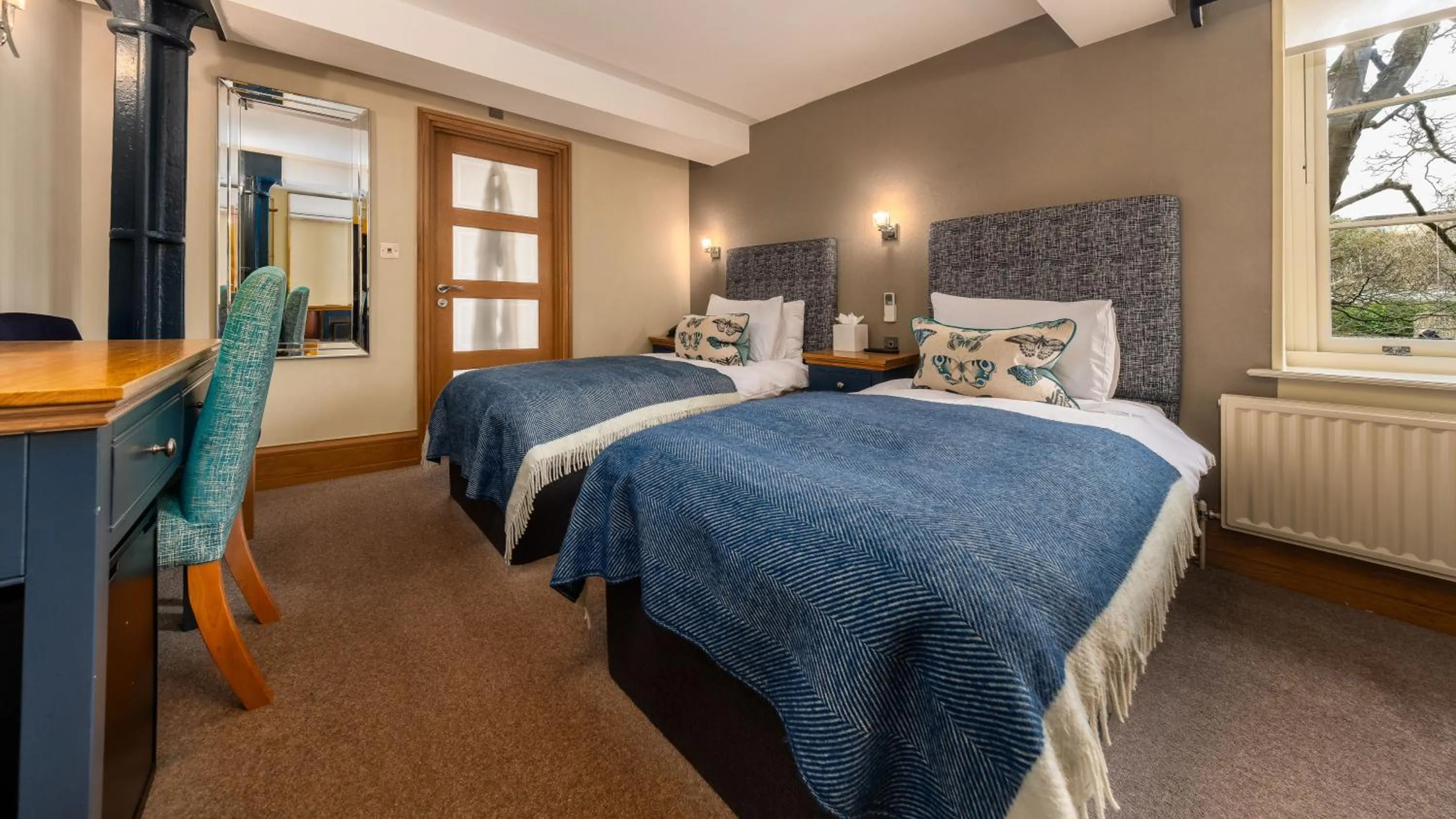 Bed in Ennios Boutique Hotel