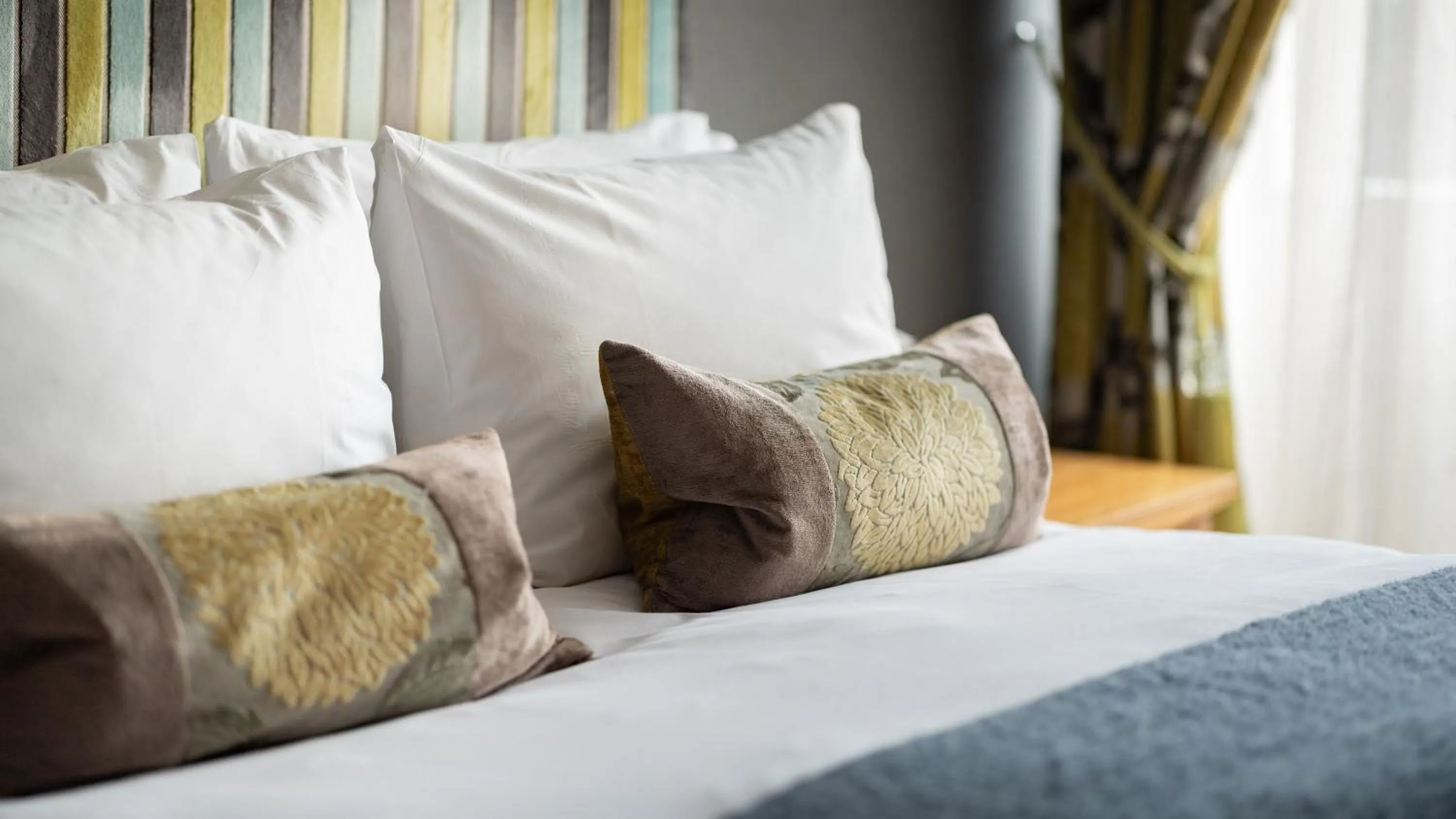 Bed in Ennios Boutique Hotel