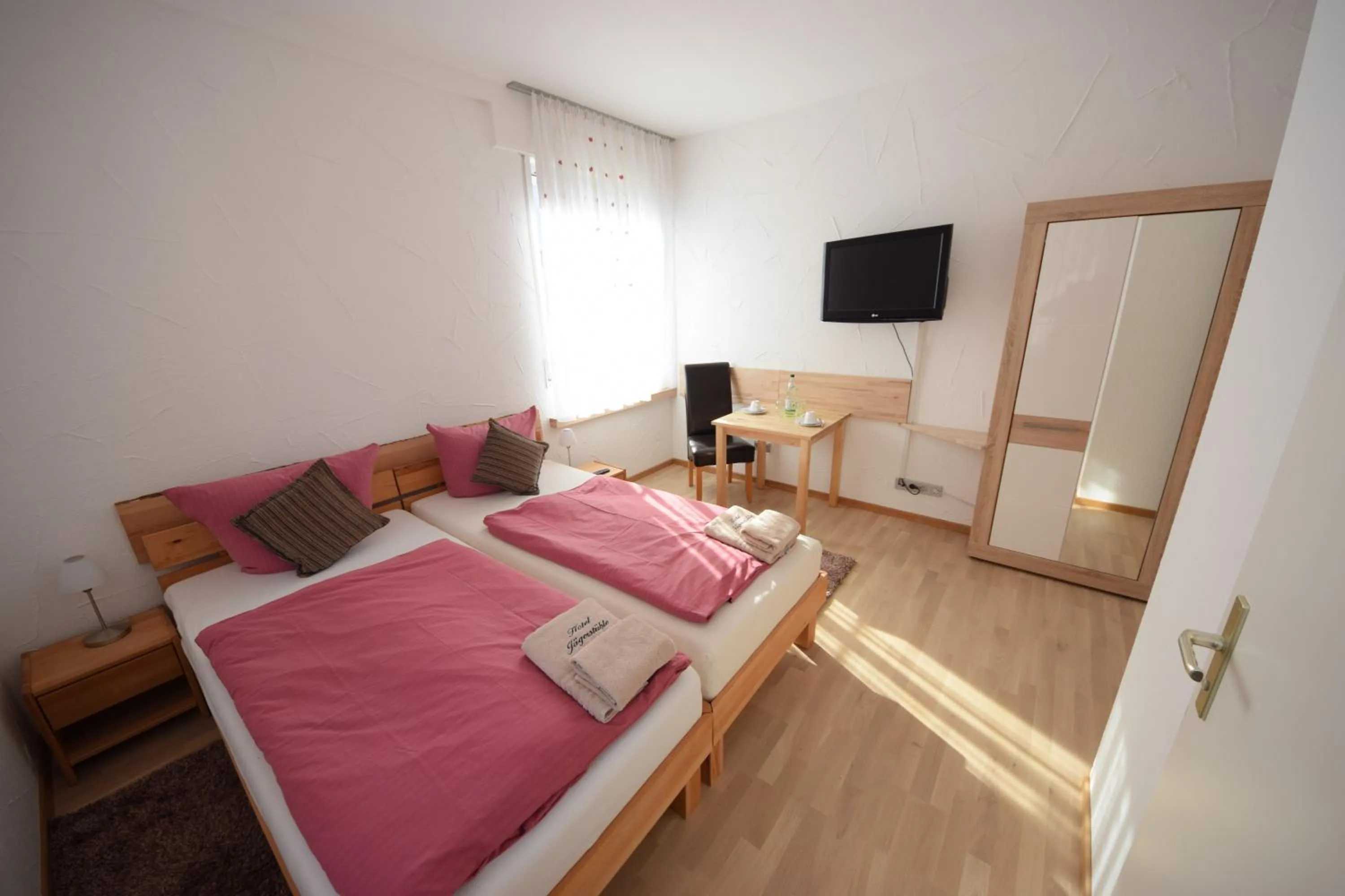 Photo of the whole room, Bed in Gästehaus Neckarsulm