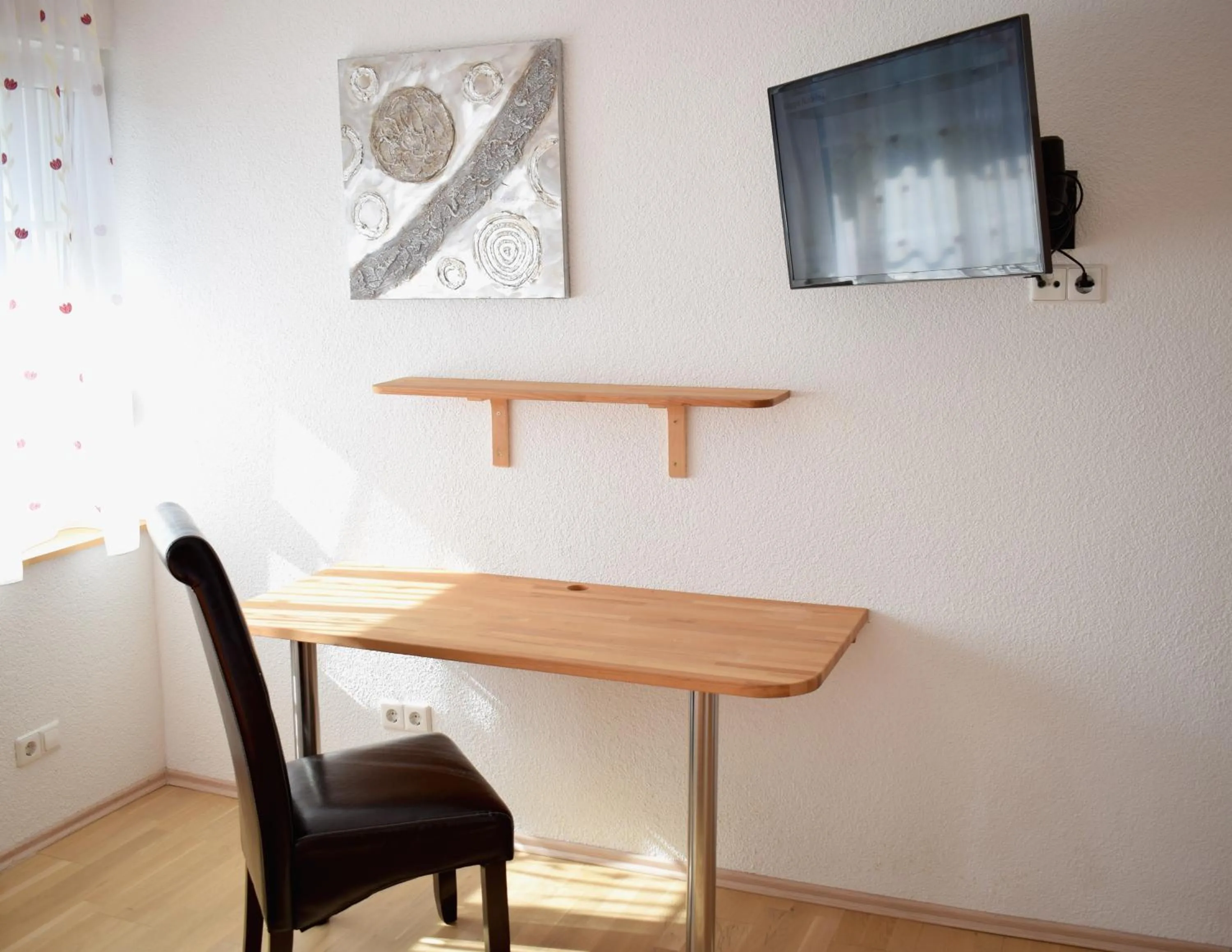 Living room in Gästehaus Neckarsulm