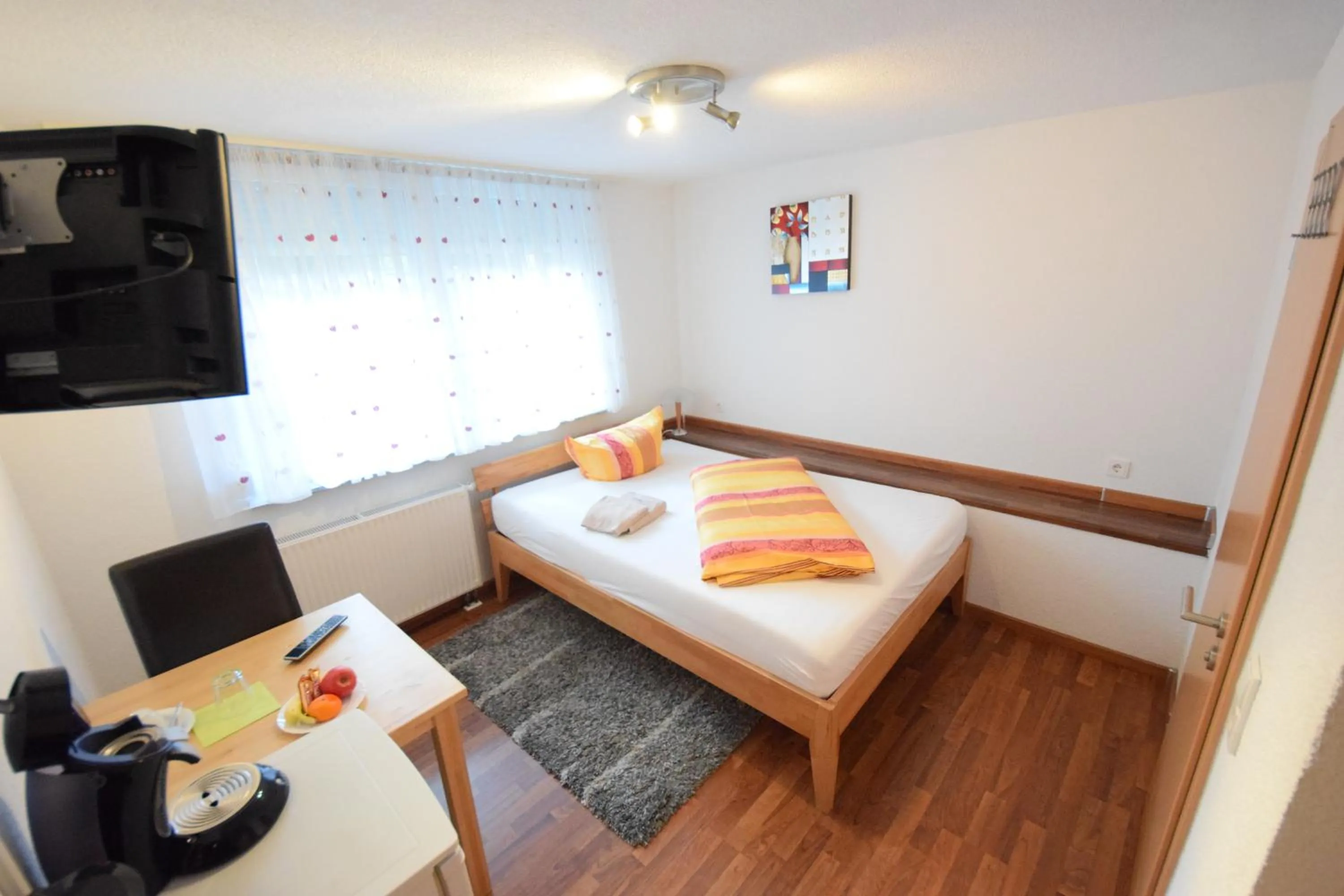 Photo of the whole room, Bed in Gästehaus Neckarsulm