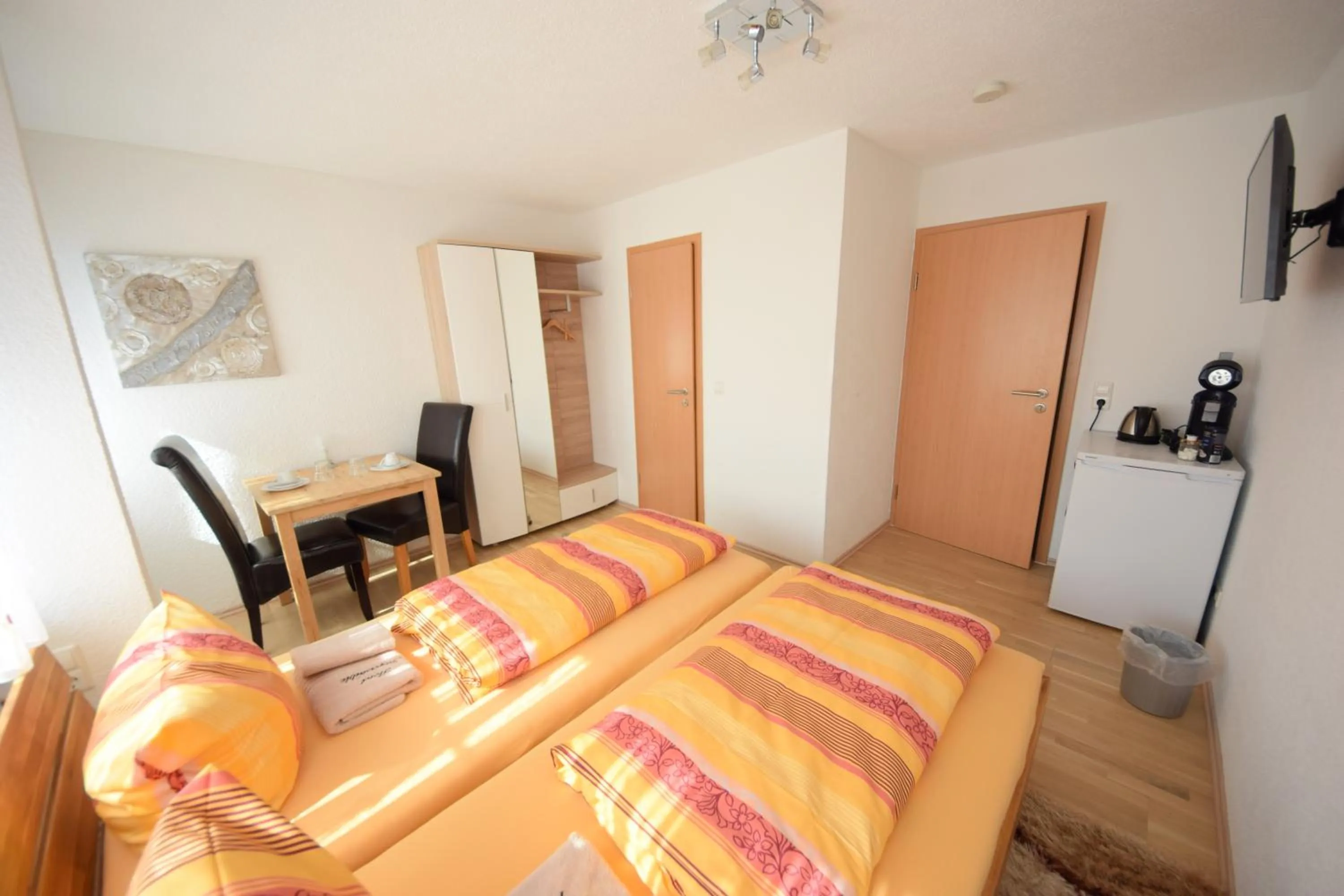 Photo of the whole room, Bed in Gästehaus Neckarsulm