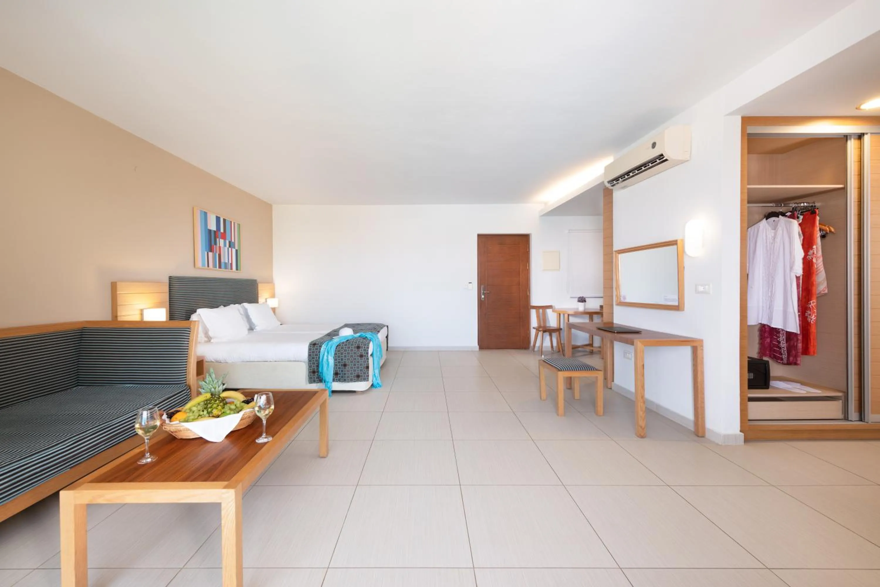 Seating area in Iolida Beach by Smile Hotels