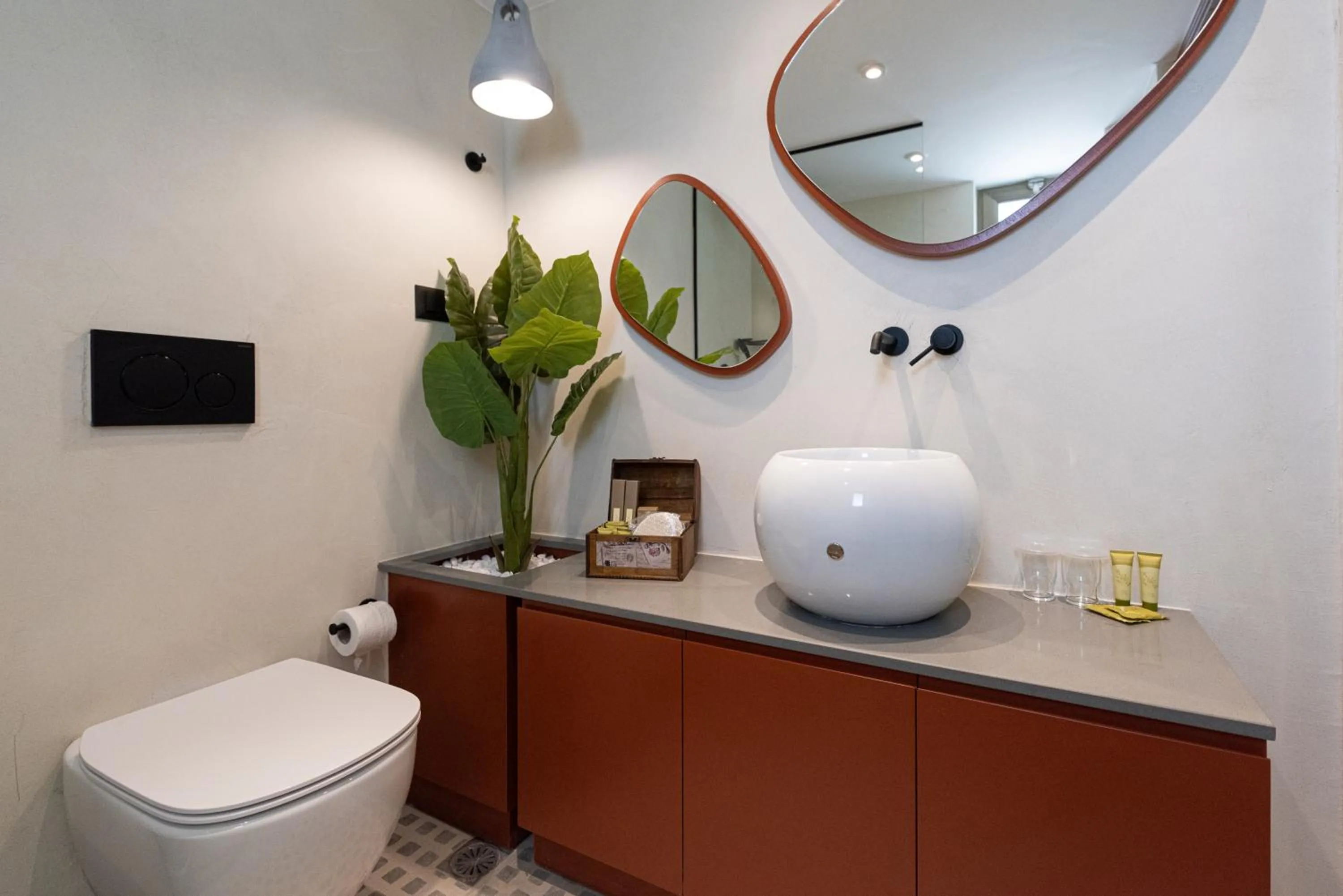 Toilet in Iolida Beach by Smile Hotels