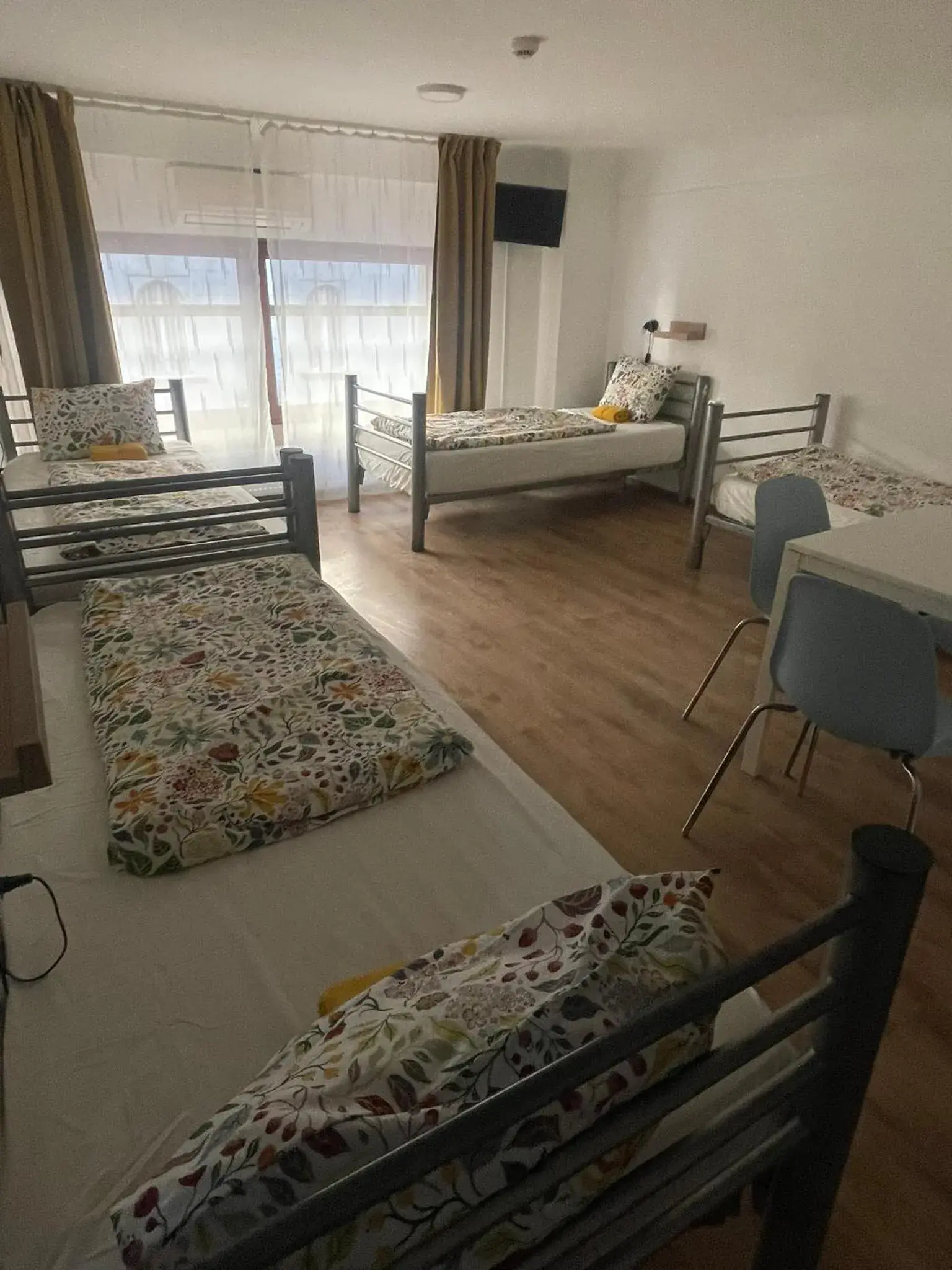 Quadruple Room with Private Bathroom in Center Hostel and Guest House Quadruple Room with Private Bathroom in Center Hostel and Guest House