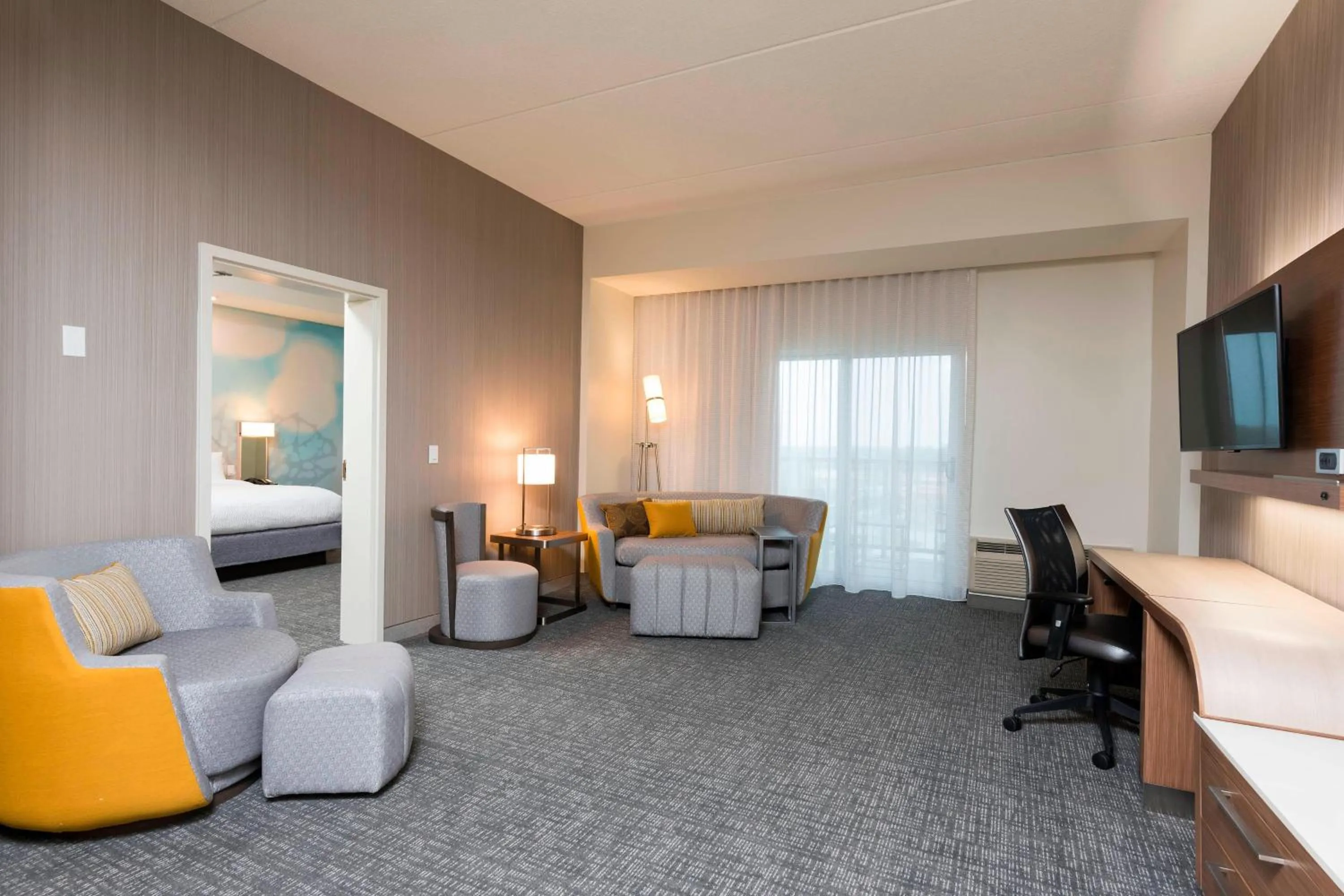 Photo of the whole room, Bed in Courtyard by Marriott Mt. Pleasant at Central Michigan University