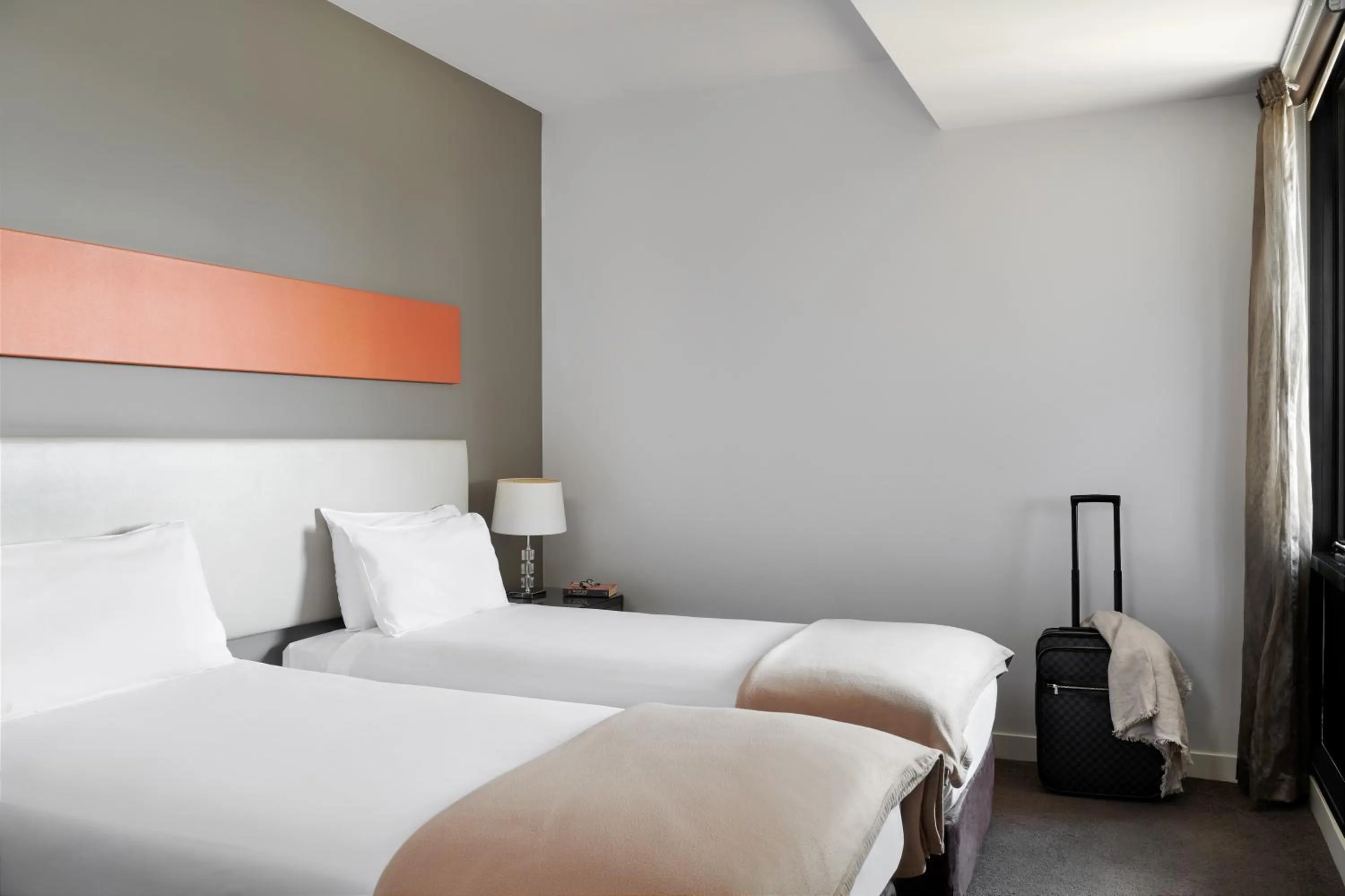 Bed in Dandenong Central Apartments Official