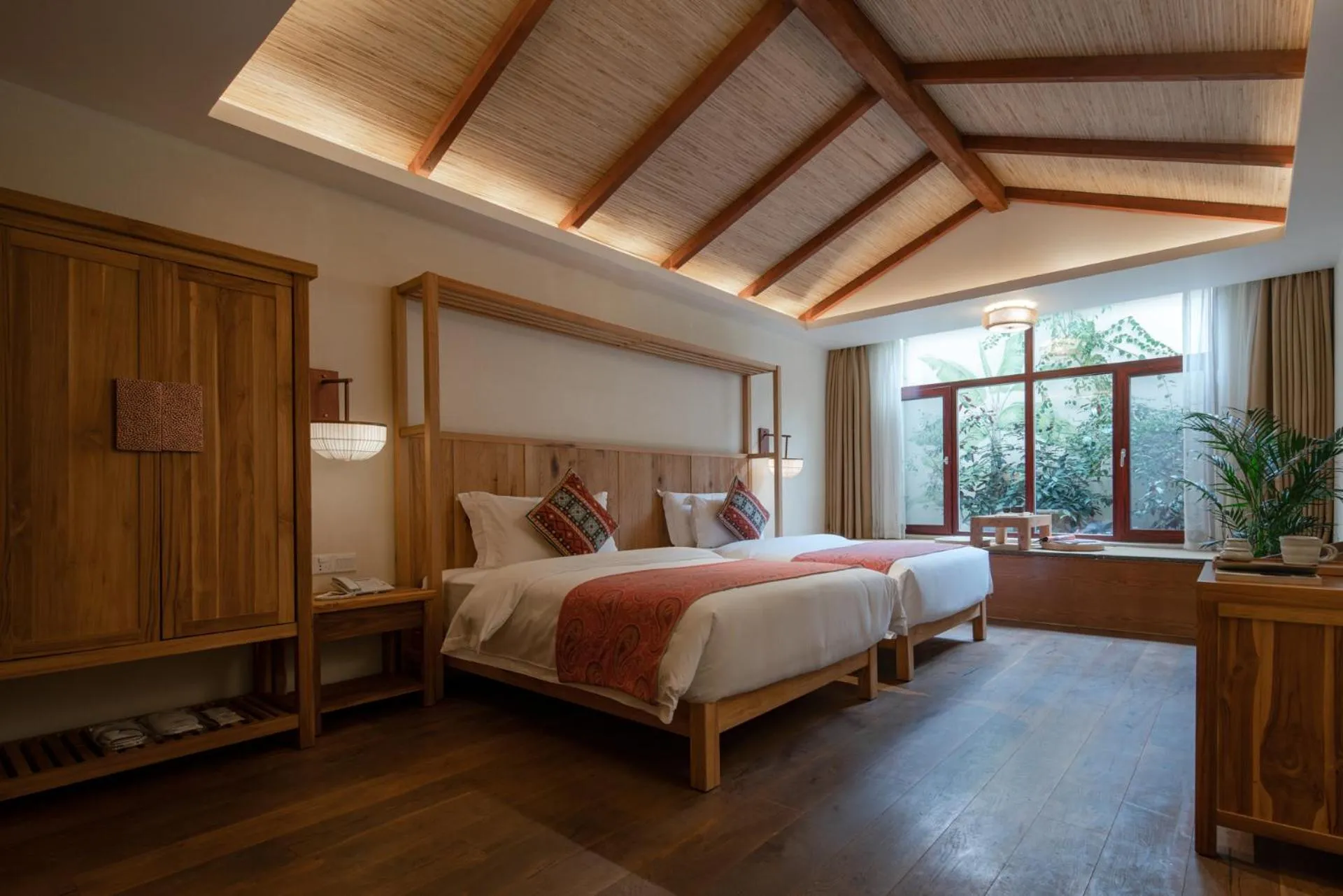 Bed in Yangshuo The Apsara Lodge