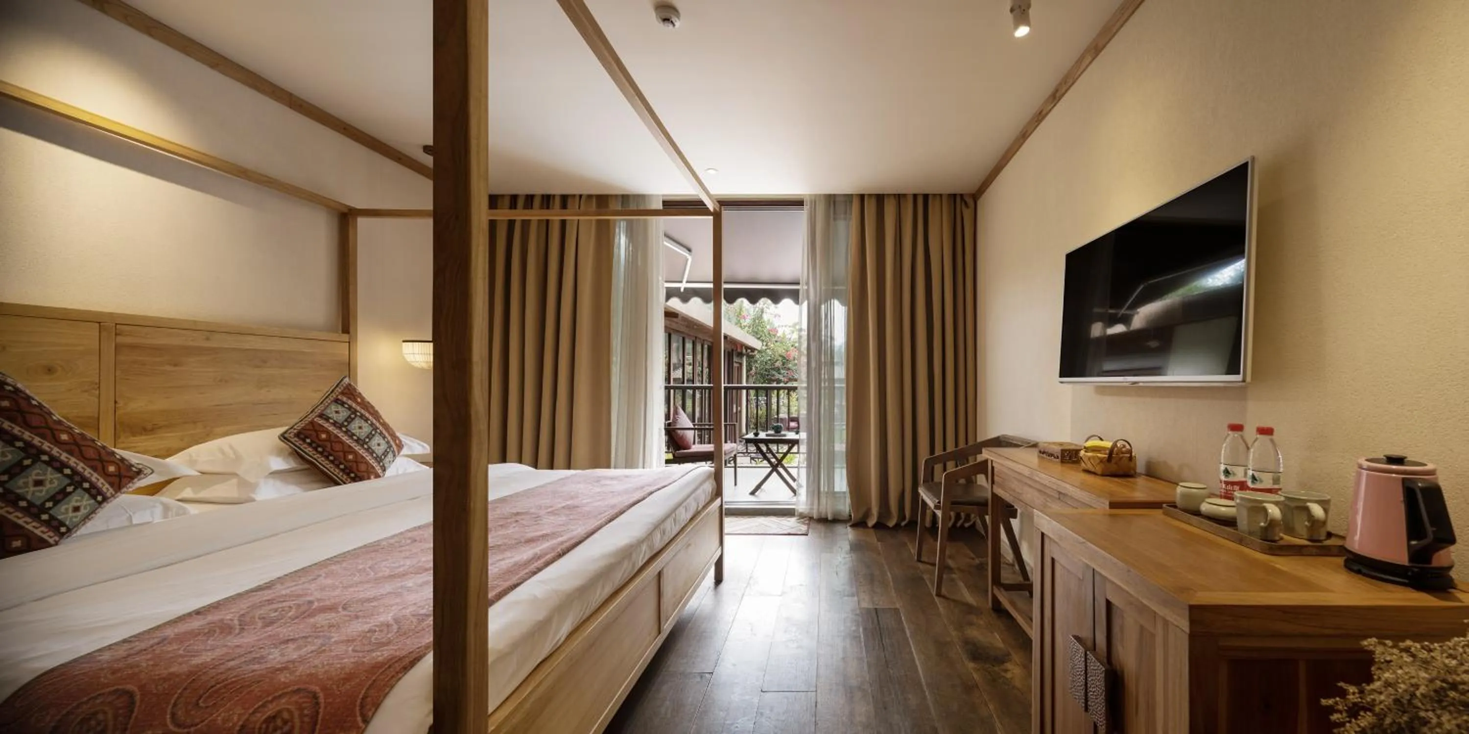 Bed in Yangshuo The Apsara Lodge