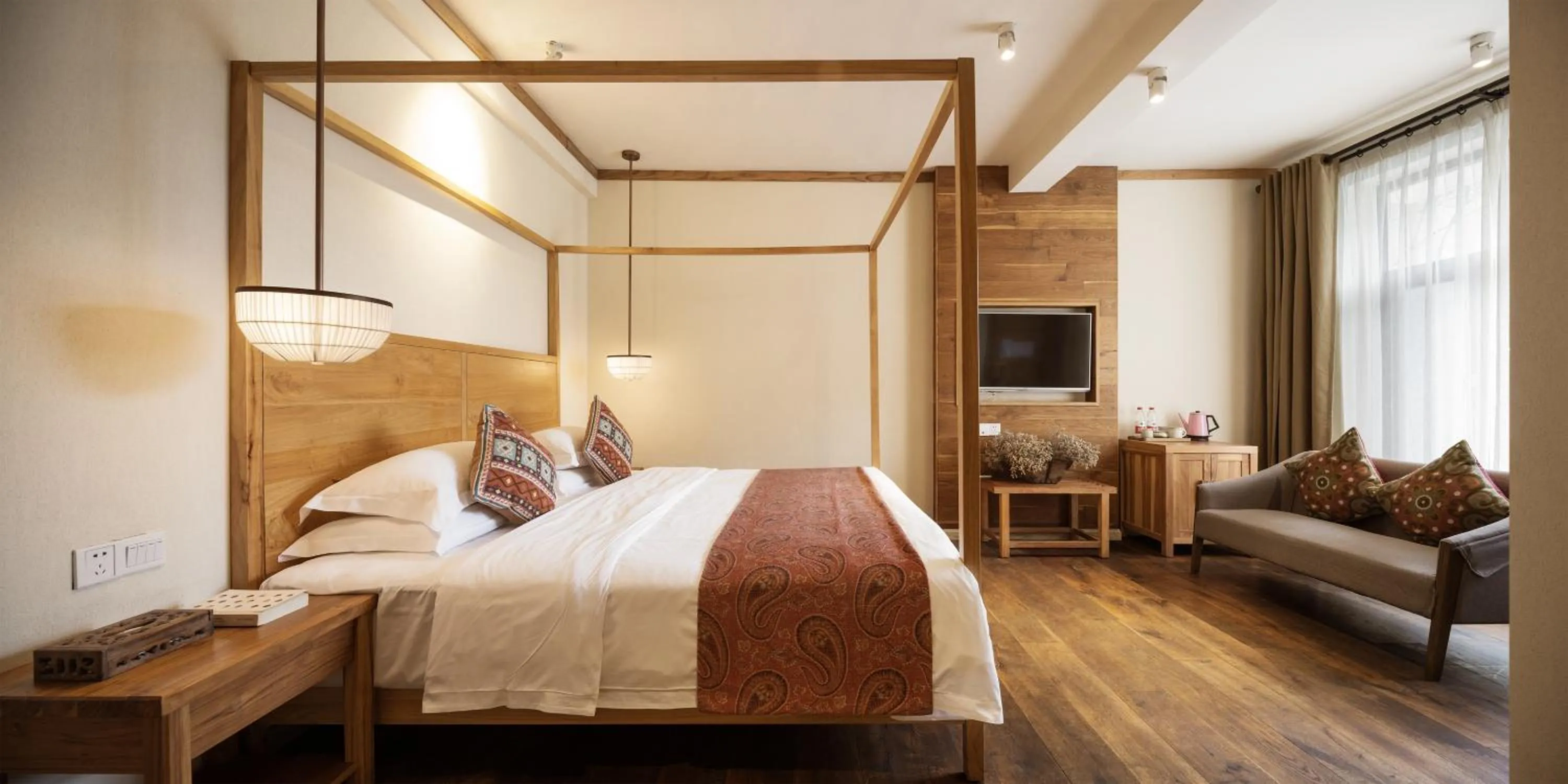 Bed in Yangshuo The Apsara Lodge